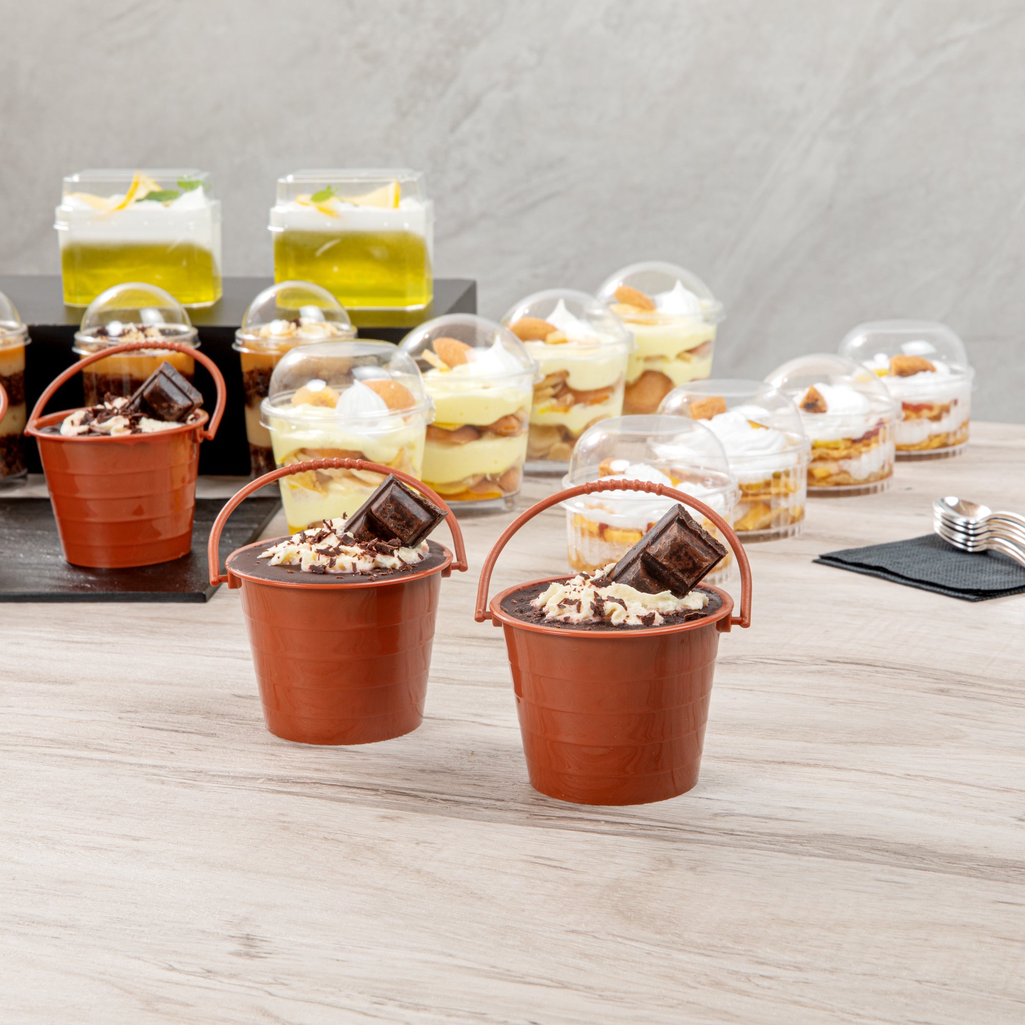 Mini Serve 2 oz Round Brown Plastic Dessert Bucket Cup - 3 1/4'' x 3 1/4'' x 2 1/4'' - 100 count box