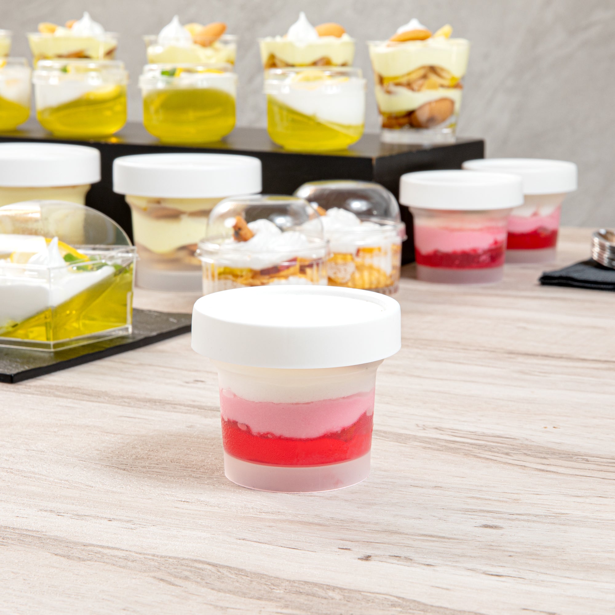 Mini Serve 5 oz Round Clear Plastic Dessert Cup - with Lid - 3'' x 3'' x 2 1/2'' - 100 count box