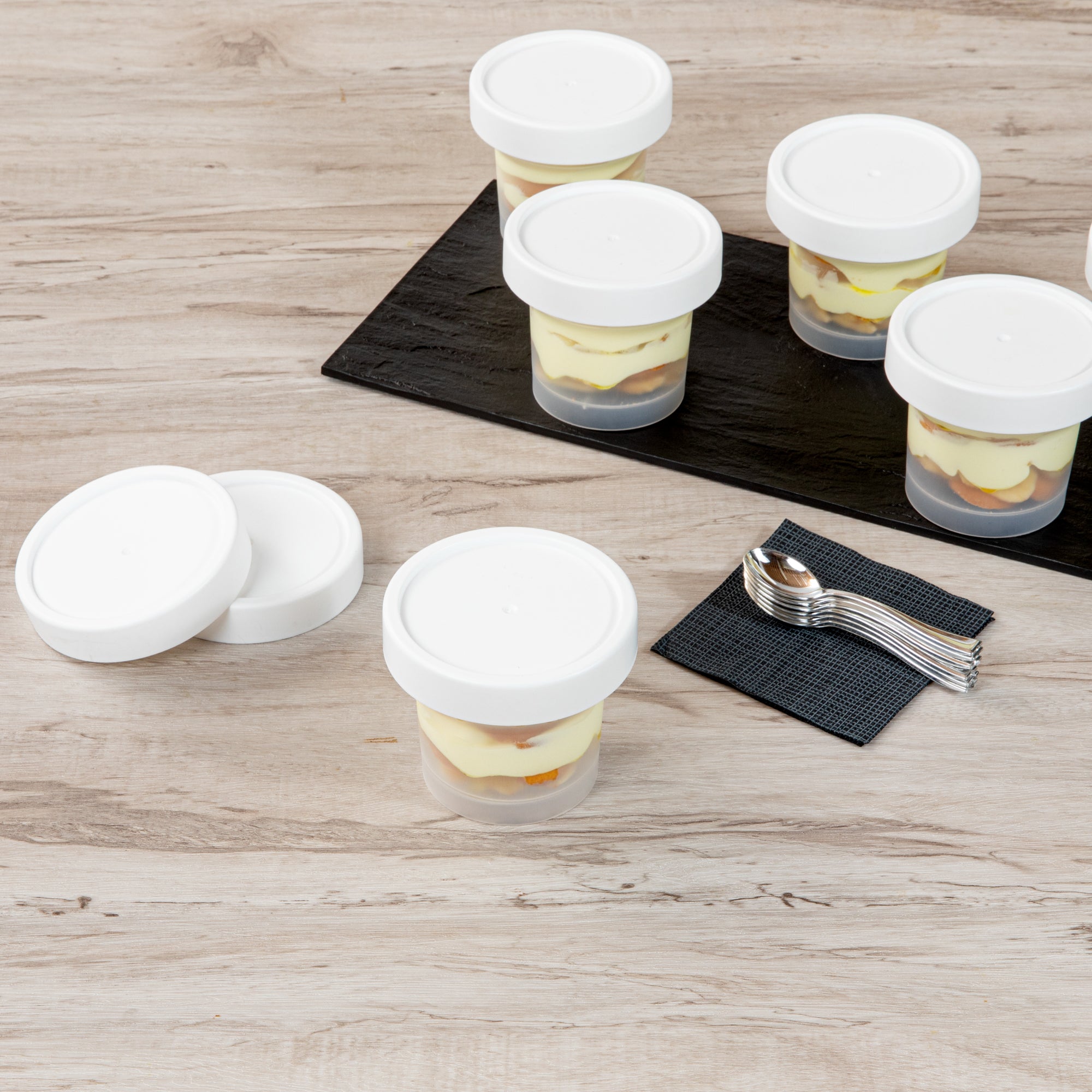 Mini Serve 8 oz Round Clear Plastic Dessert Cup - with Lid - 3 1/2'' x 3 1/2'' x 3'' - 25 count box