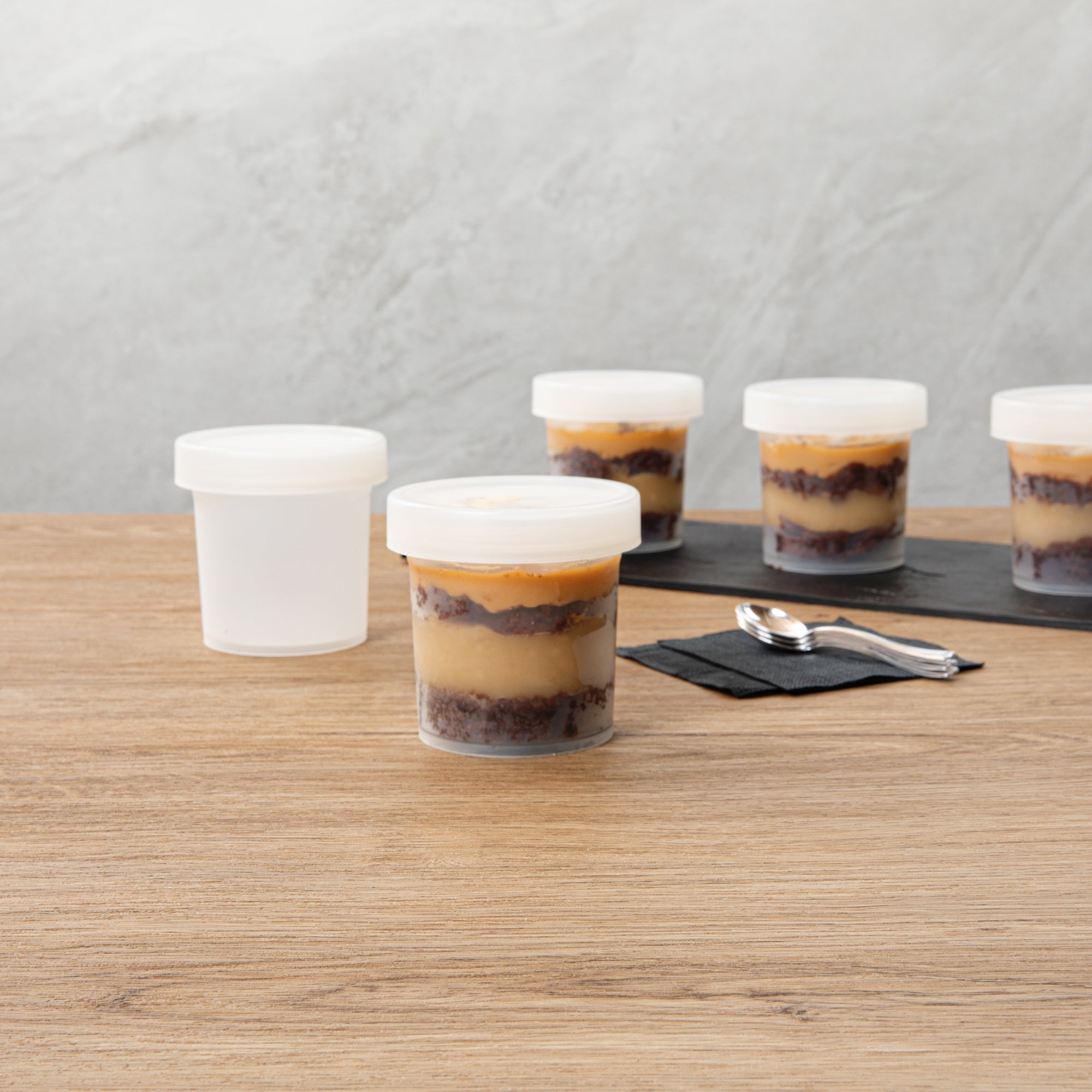 Mini Serve 10 oz Round Clear Plastic Dessert Cup - with Lid - 3 1/2'' x 3 1/2'' x 3 1/2'' - 100 count box