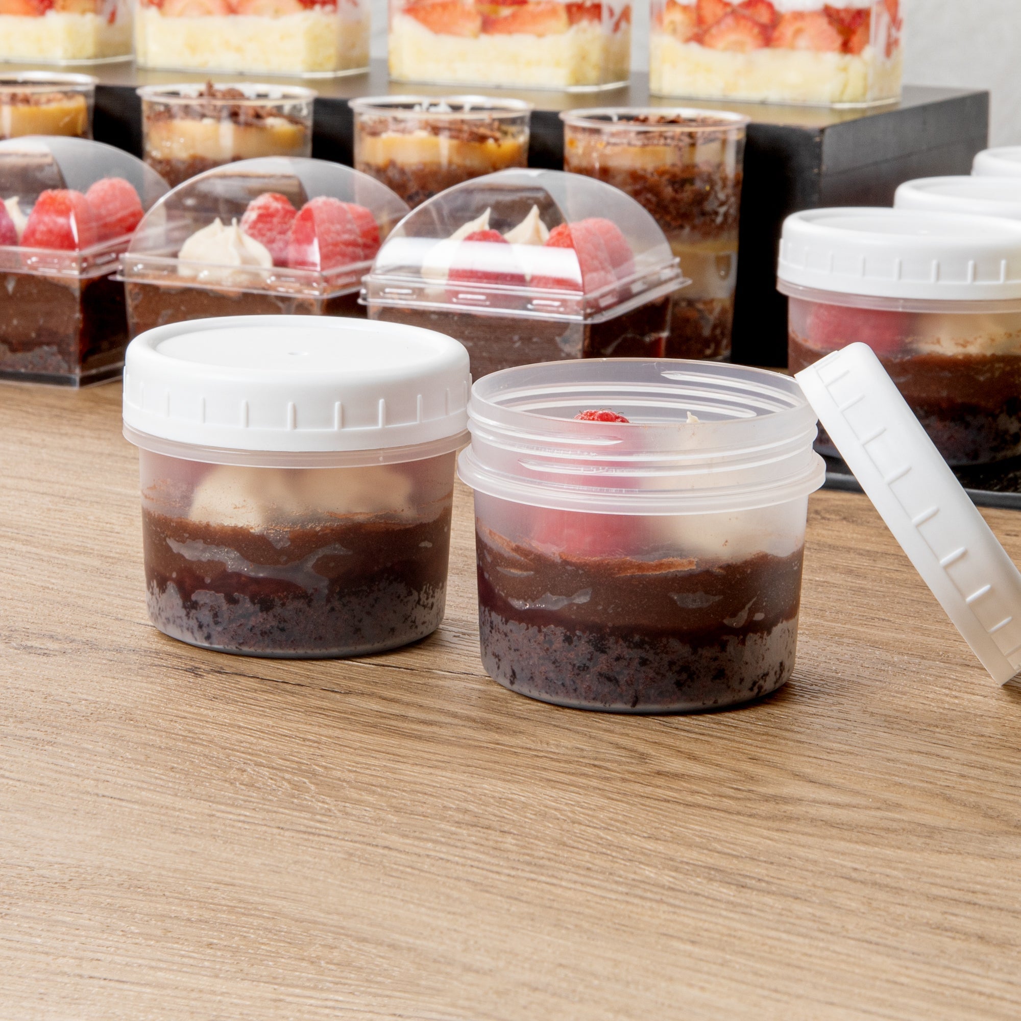 Mini Serve 7 oz Round Clear Plastic Dessert Cup - with Lid - 2 3/4'' x 2 3/4'' x 2 1/2'' - 25 count box