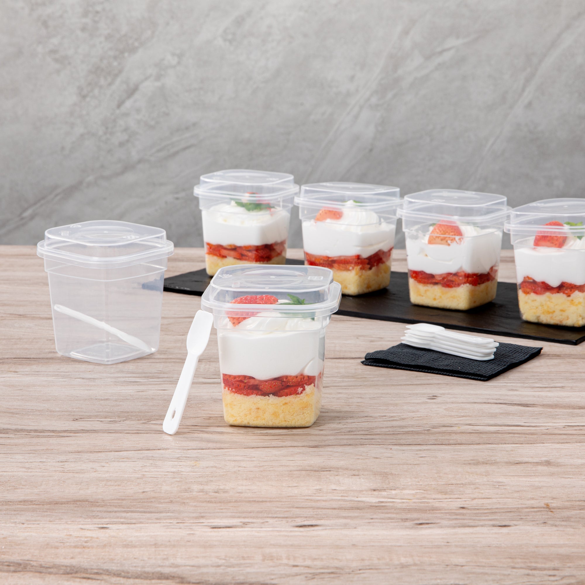 Mini Serve 7 oz Square Clear Plastic Dessert Cup - with Lid and Spoon - 3 1/4'' x 3 1/4'' x 3 1/2'' - 25 count box