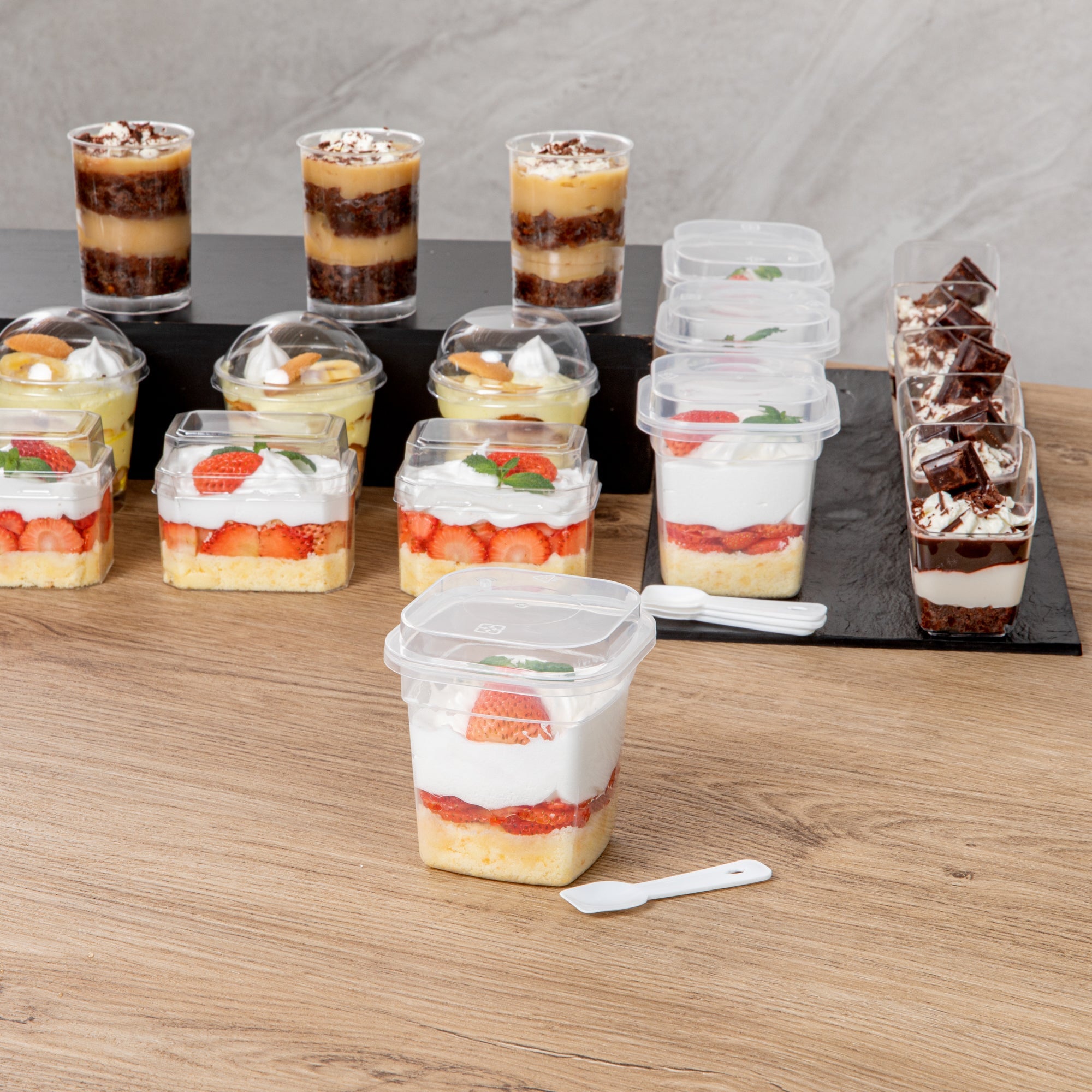 Mini Serve 7 oz Square Clear Plastic Dessert Cup - with Lid and Spoon - 3 1/4'' x 3 1/4'' x 3 1/2'' - 25 count box