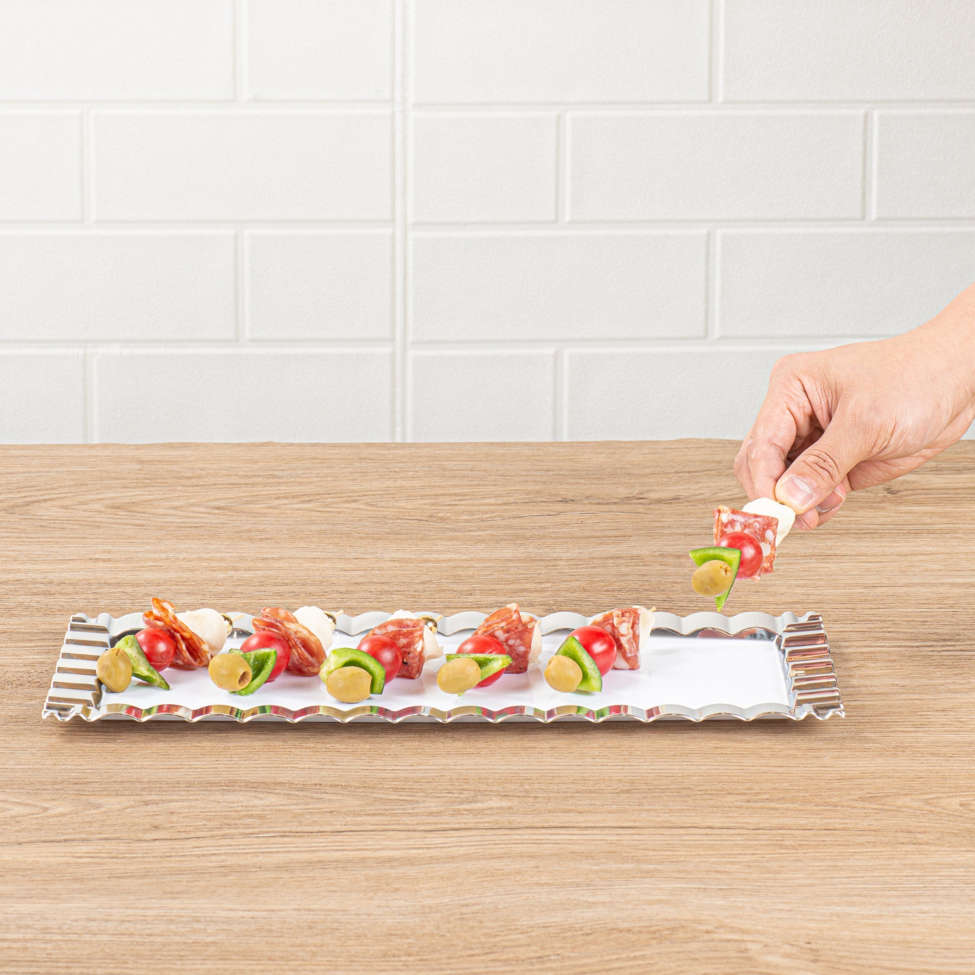 Maxi Serve Rectangle White Plastic Plate - with Silver Ruffled Rim - 14 1/4" x 6 1/4" - 100 count box