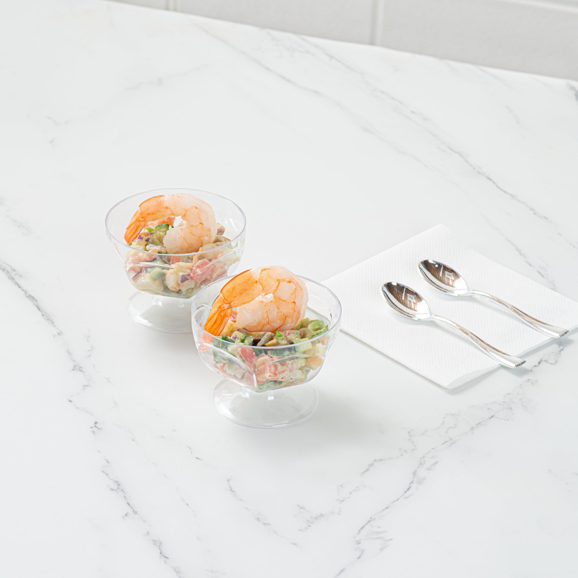 Mini Serve 3 oz Clear Plastic Footed Bowl - 3" x 3" x 2 1/4" - 100 count box