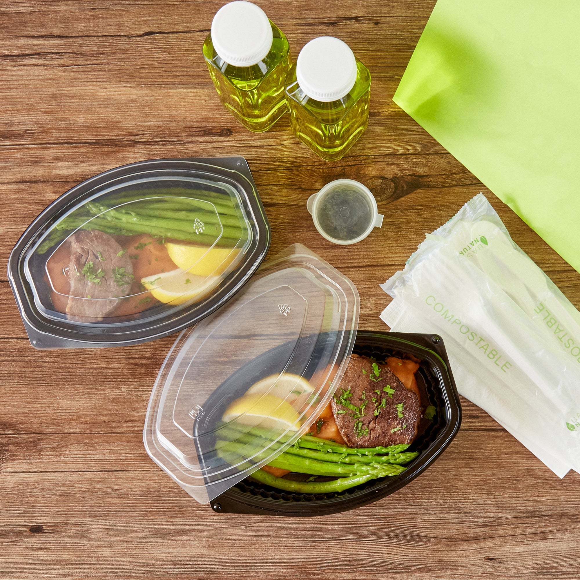 Chef 101 16 oz Oval Black Plastic Food Container - with Clear Lid, Microwavable - 8" x 5 1/2" x 2 1/4" - 100 count box
