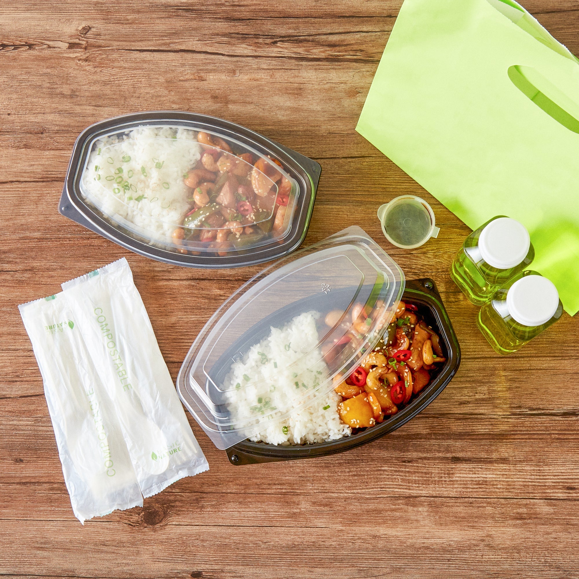 Chef 101 21 oz Oval Black Plastic Food Container - with Clear Lid, Microwavable - 9 1/4" x 5 3/4" x 2 1/4" - 100 count box