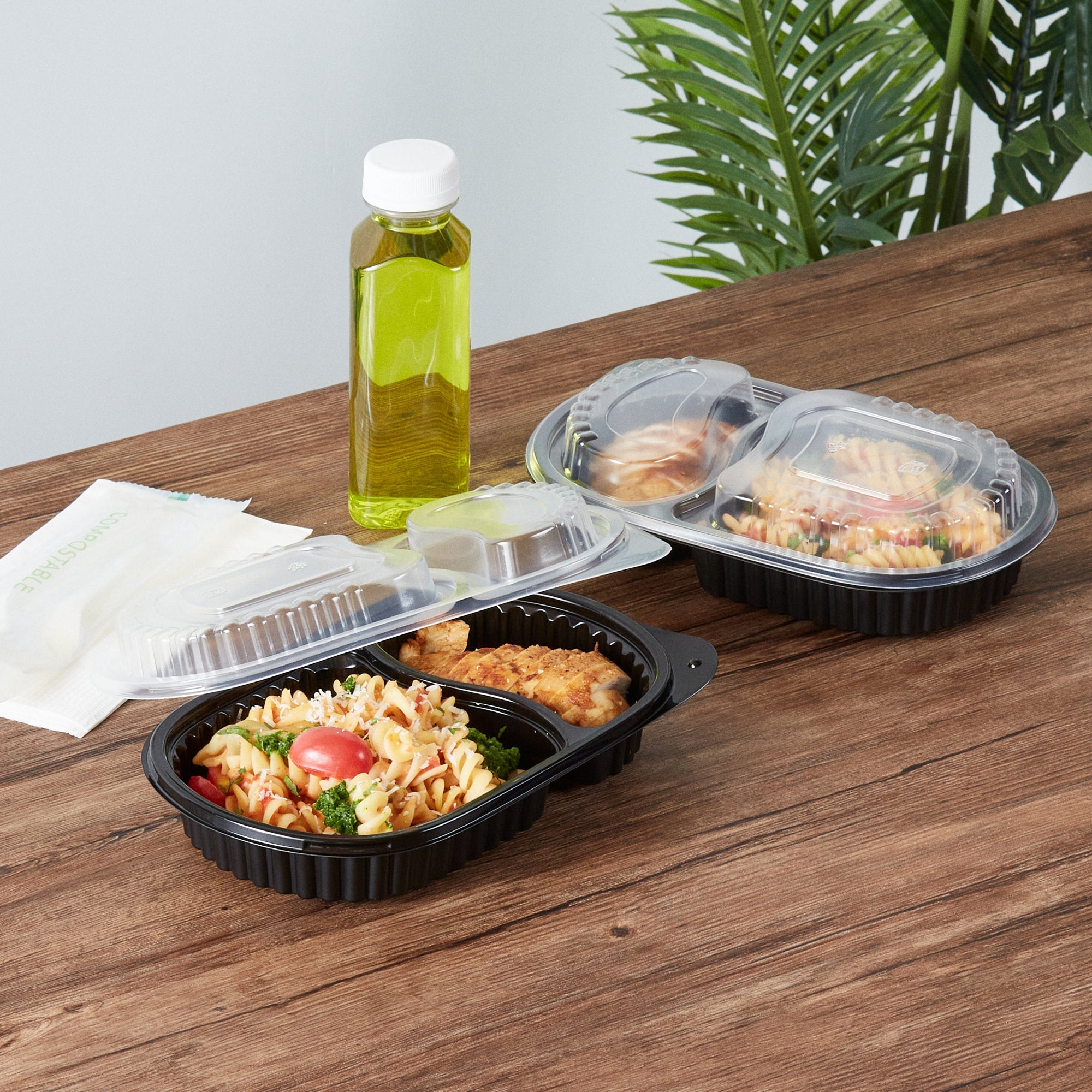 Chef 101 20 oz Oval Black Plastic Food Container - with Clear Dome Lid, Microwavable - 9 1/4" x 6" x 2 1/4" - 100 count box