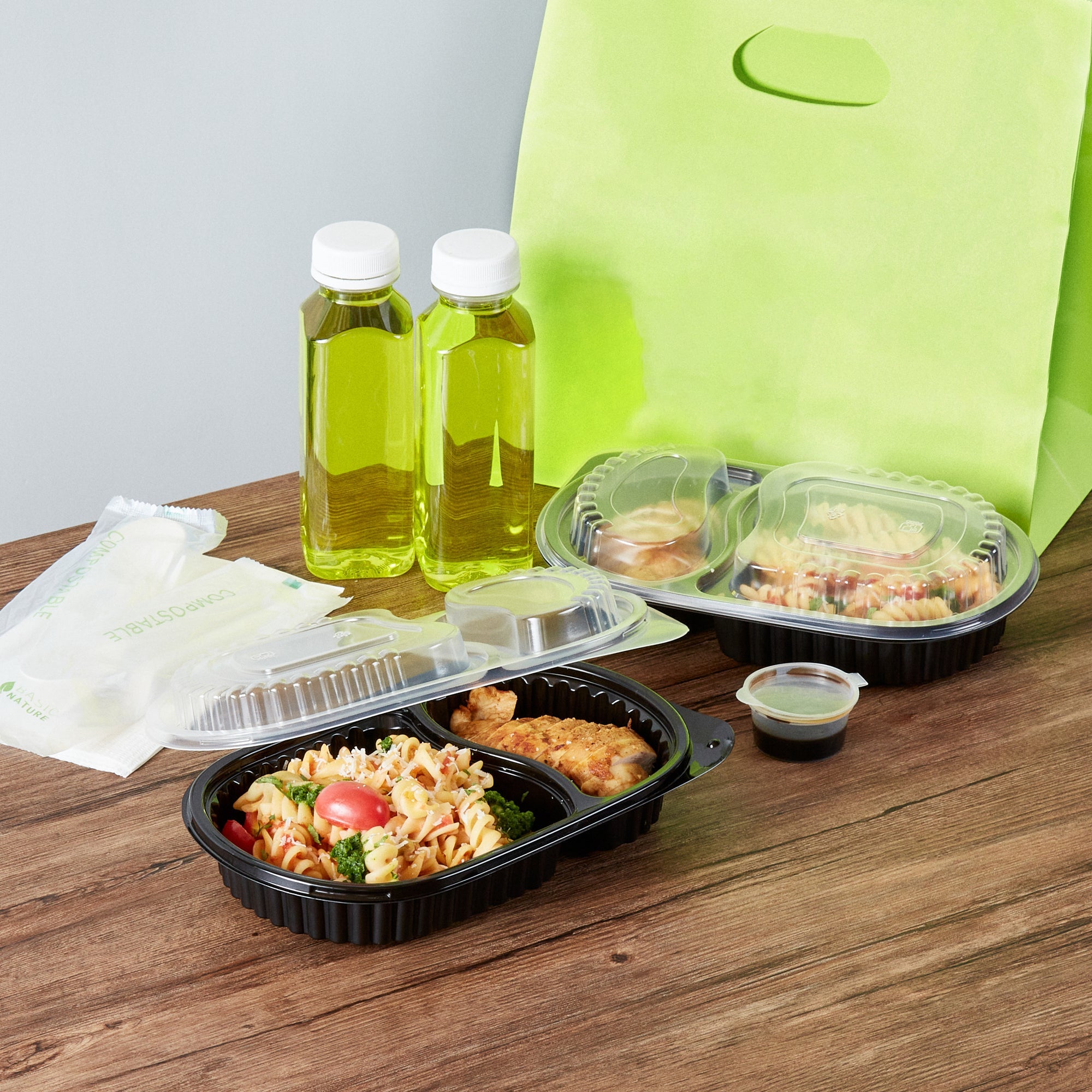 Chef 101 20 oz Oval Black Plastic Food Container - with Clear Dome Lid, Microwavable - 9 1/4" x 6" x 2 1/4" - 50 count box
