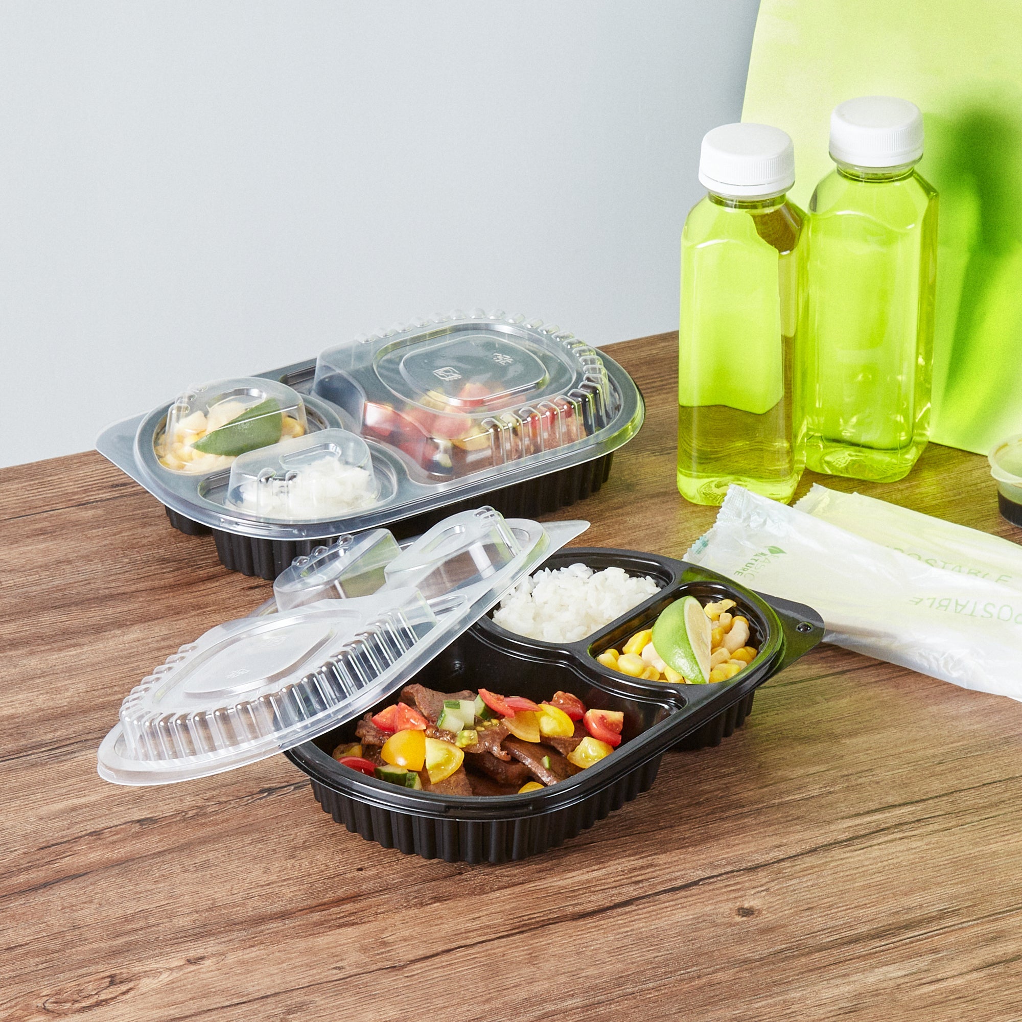 Chef 101 19 oz Oval Black Plastic Food Container - with Clear Lid, 3 Compartments, Microwavable - 9 1/4" x 6" x 2 1/4" - 50 count box