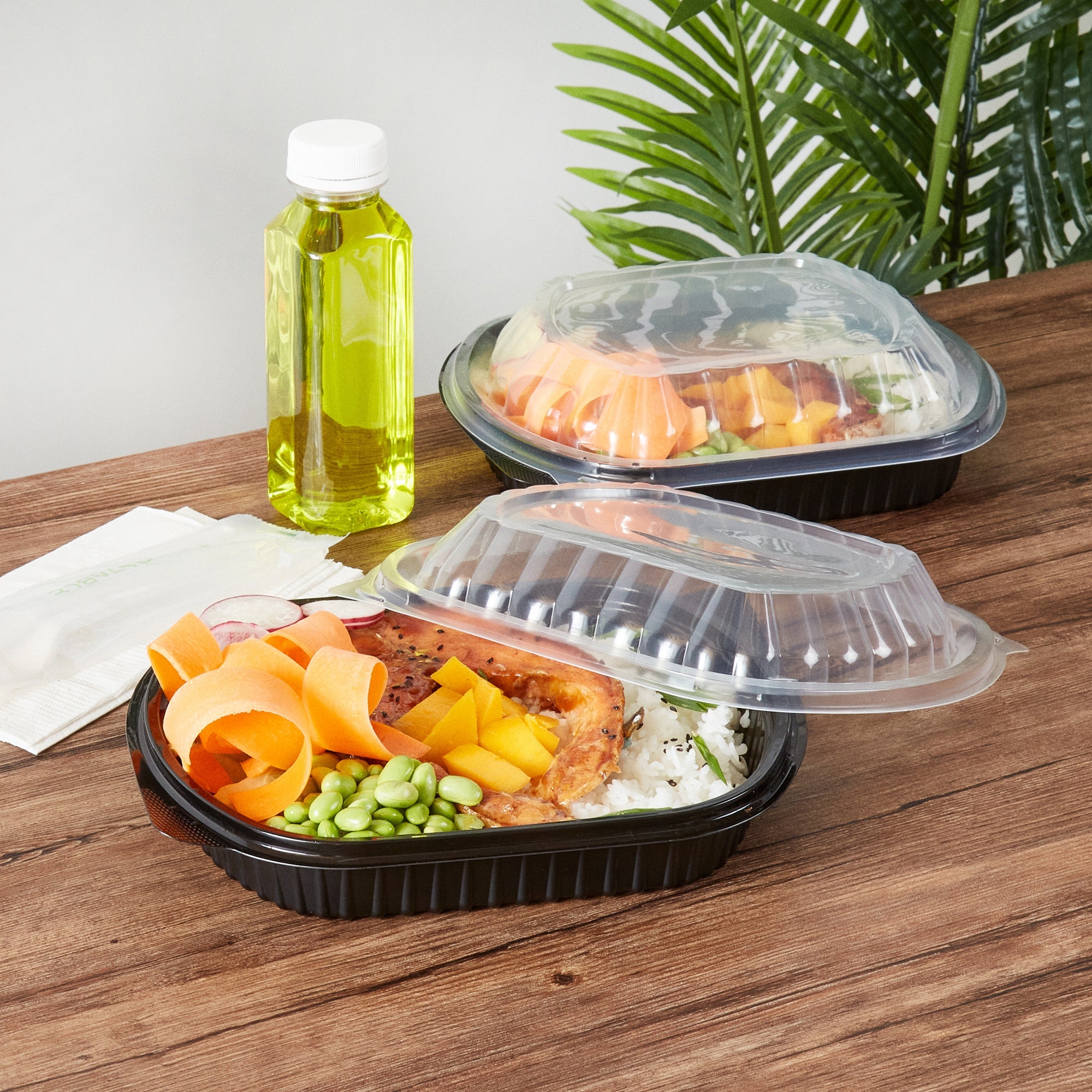 Chef 101 34 oz Oval Black Plastic Food Container - with Clear Lid, Microwavable - 9 1/2" x 8" x 2 3/4" - 100 count box