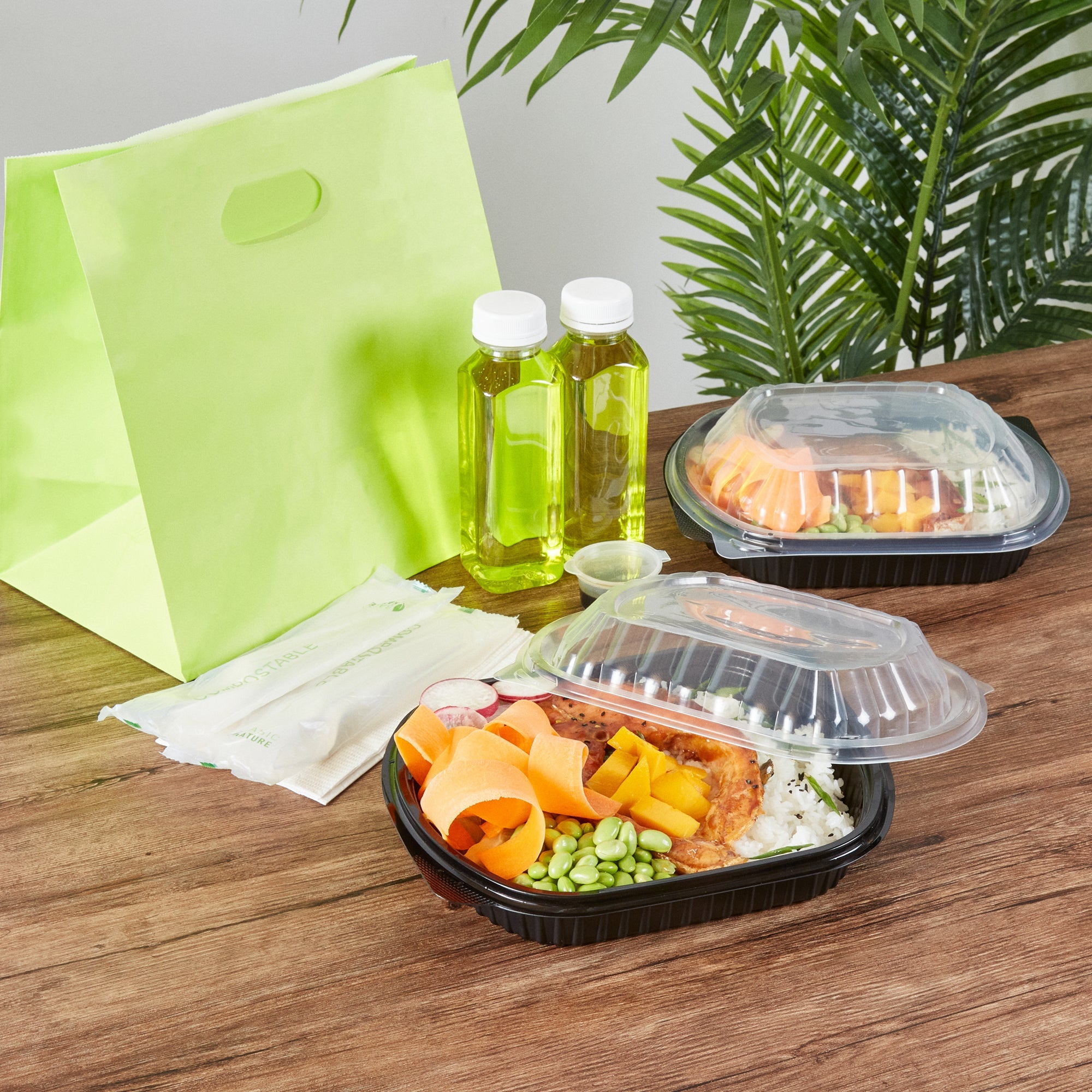 Chef 101 34 oz Oval Black Plastic Food Container - with Clear Lid, Microwavable - 9 1/2" x 8" x 2 3/4" - 50 count box