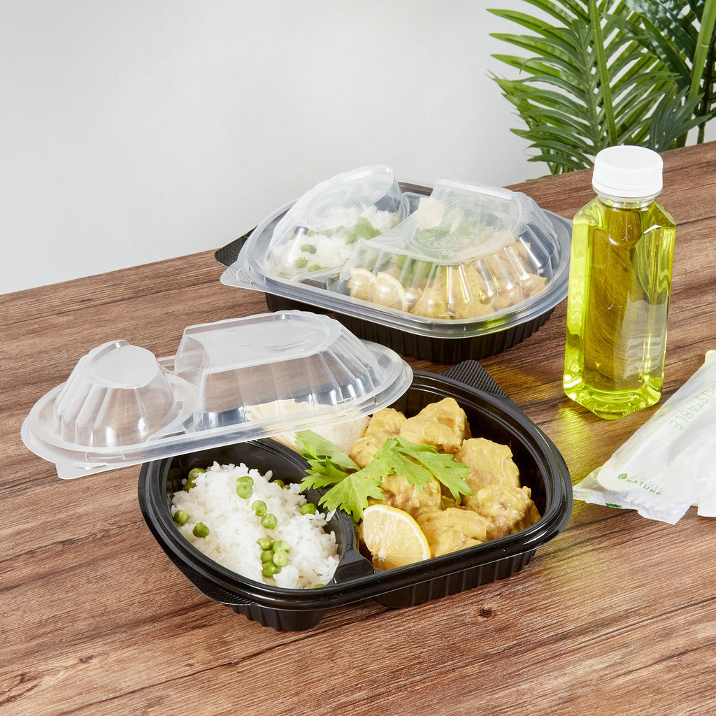 Chef 101 28 oz Oval Black Plastic Food Container - with Clear Lid, 2 Compartments, Microwavable - 9 1/2" x 8" x 2 3/4" - 100 count box