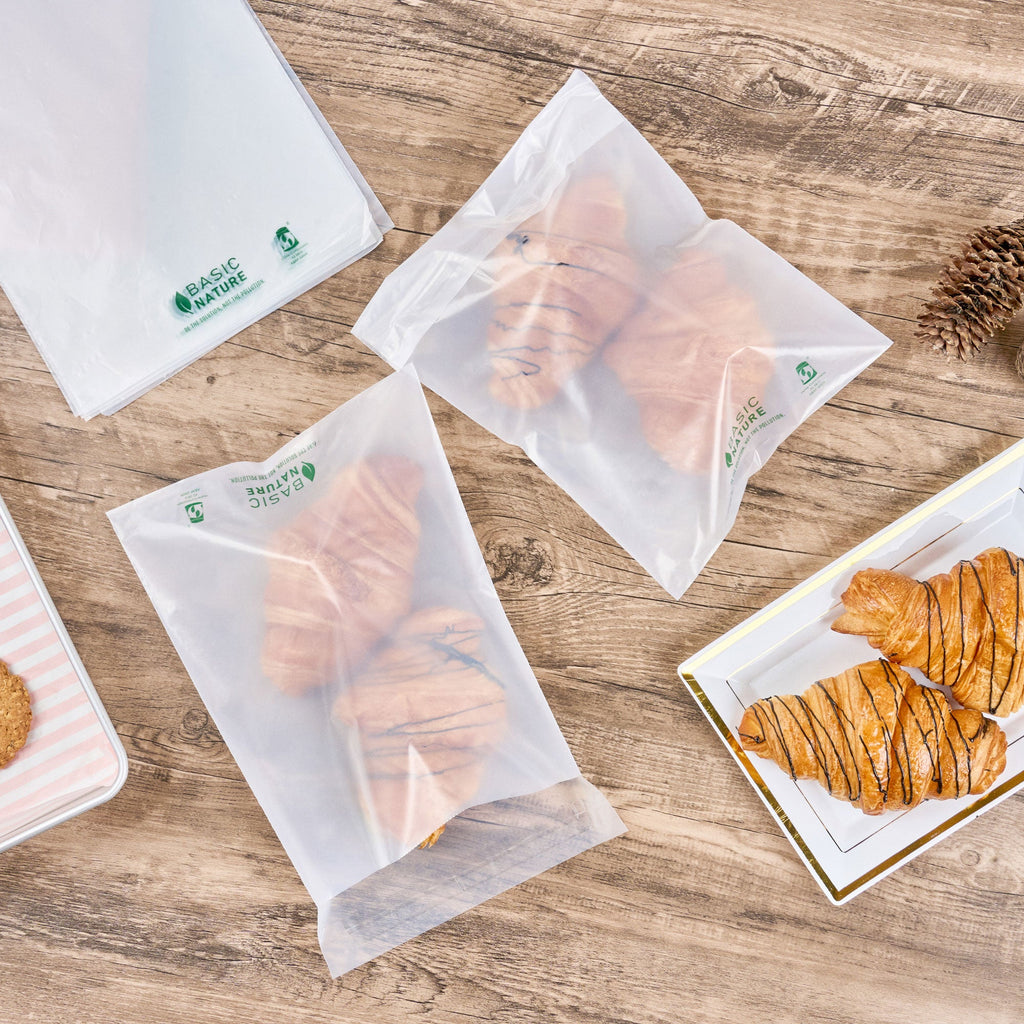 Basic Nature Translucent PLA Plastic / PBAT Lip and Tape Bag - Self-Sealing, Compostable - 10" x 8" - 100 count box