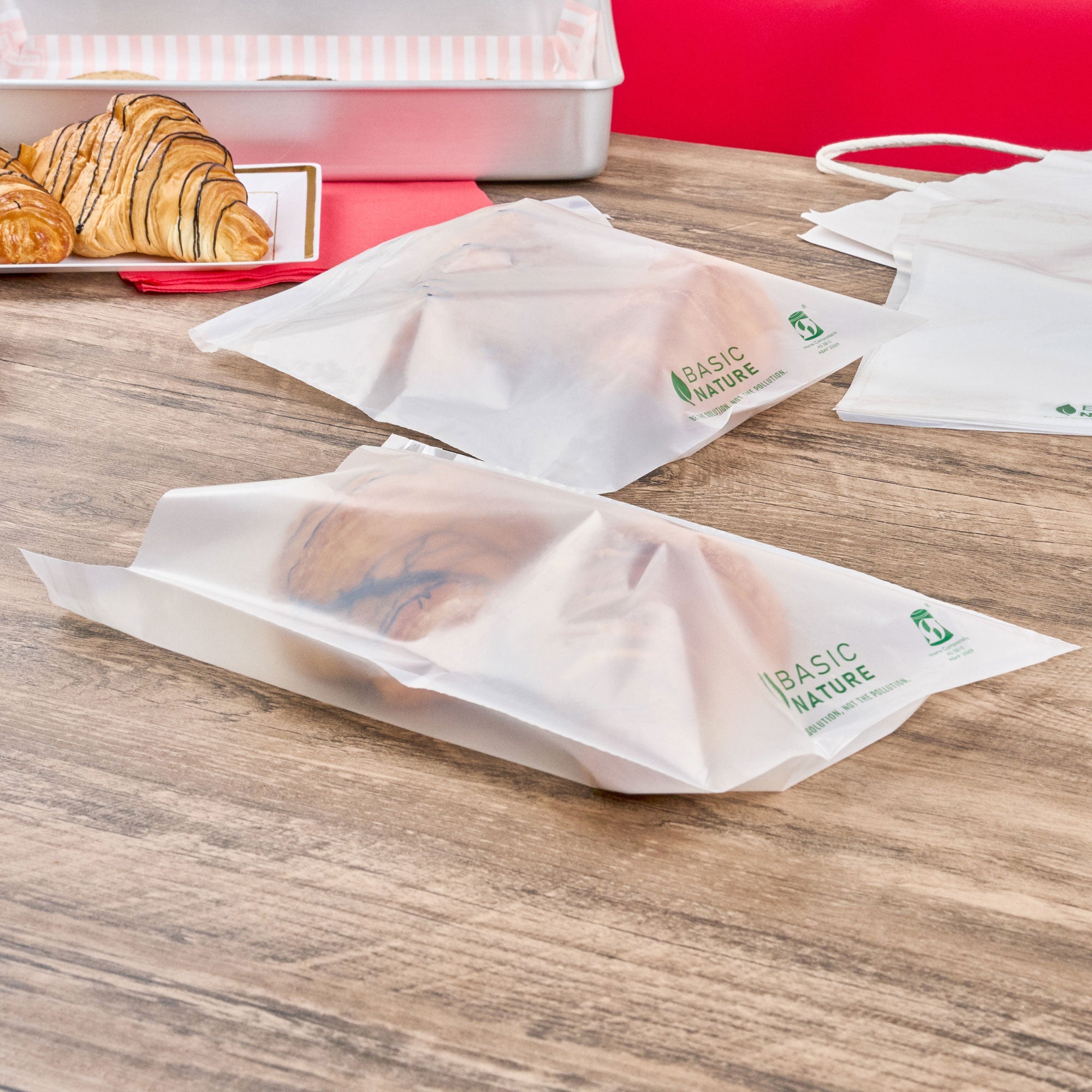 Basic Nature Translucent PLA Plastic / PBAT Lip and Tape Bag - Self-Sealing, Compostable - 10" x 8" - 100 count box