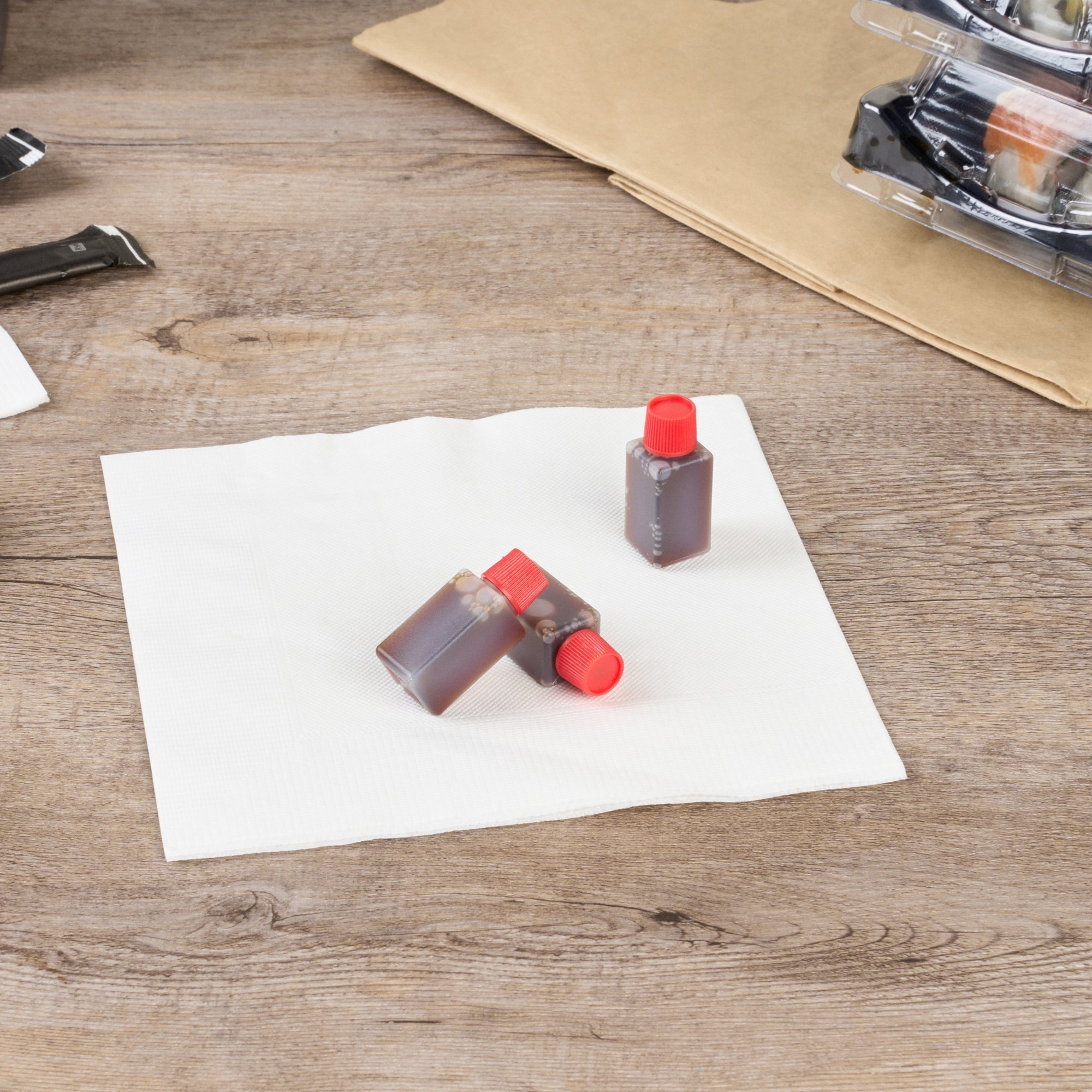 Bento Tek 6 mL Translucent Plastic Soy Sauce Bottle - with Red Cap - 1/2" x 1/2" x 1 3/4" - 1000 count box