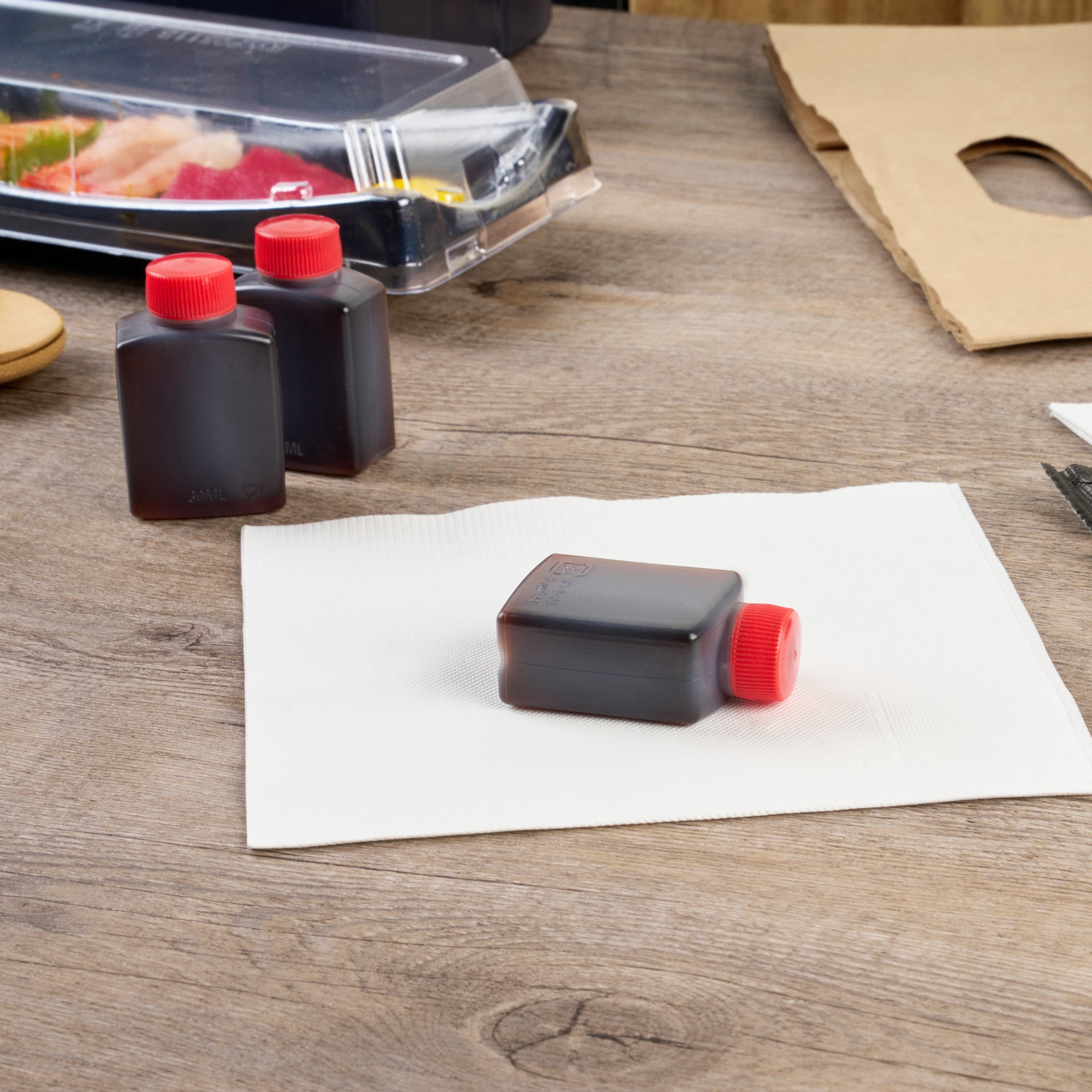 Bento Tek 1 oz Translucent Plastic Soy Sauce Bottle - with Red Cap - 1 1/2" x 3/4" x 2 1/4" - 1000 count box