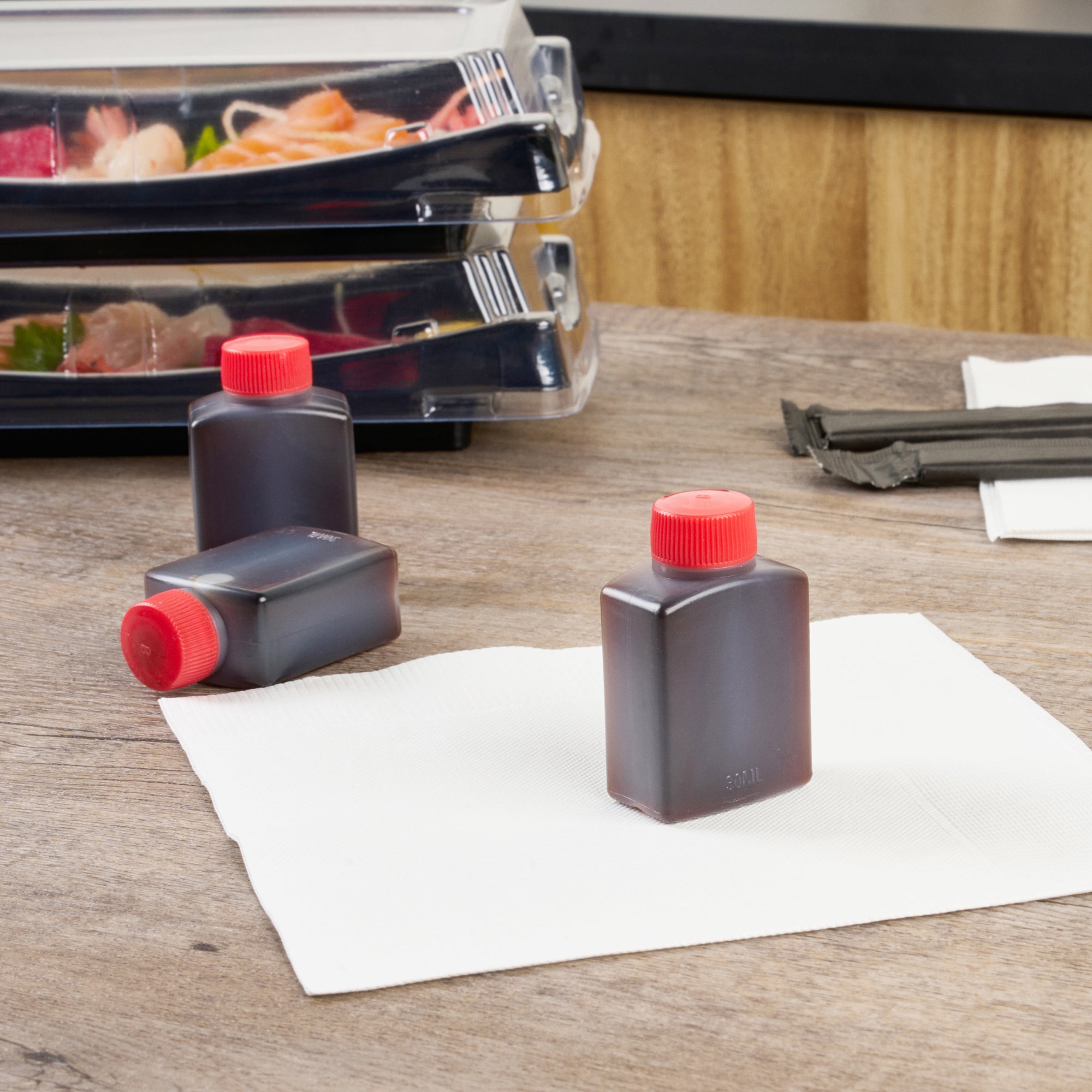 Bento Tek 1 oz Translucent Plastic Soy Sauce Bottle - with Red Cap - 1 1/2" x 3/4" x 2 1/4" - 1000 count box