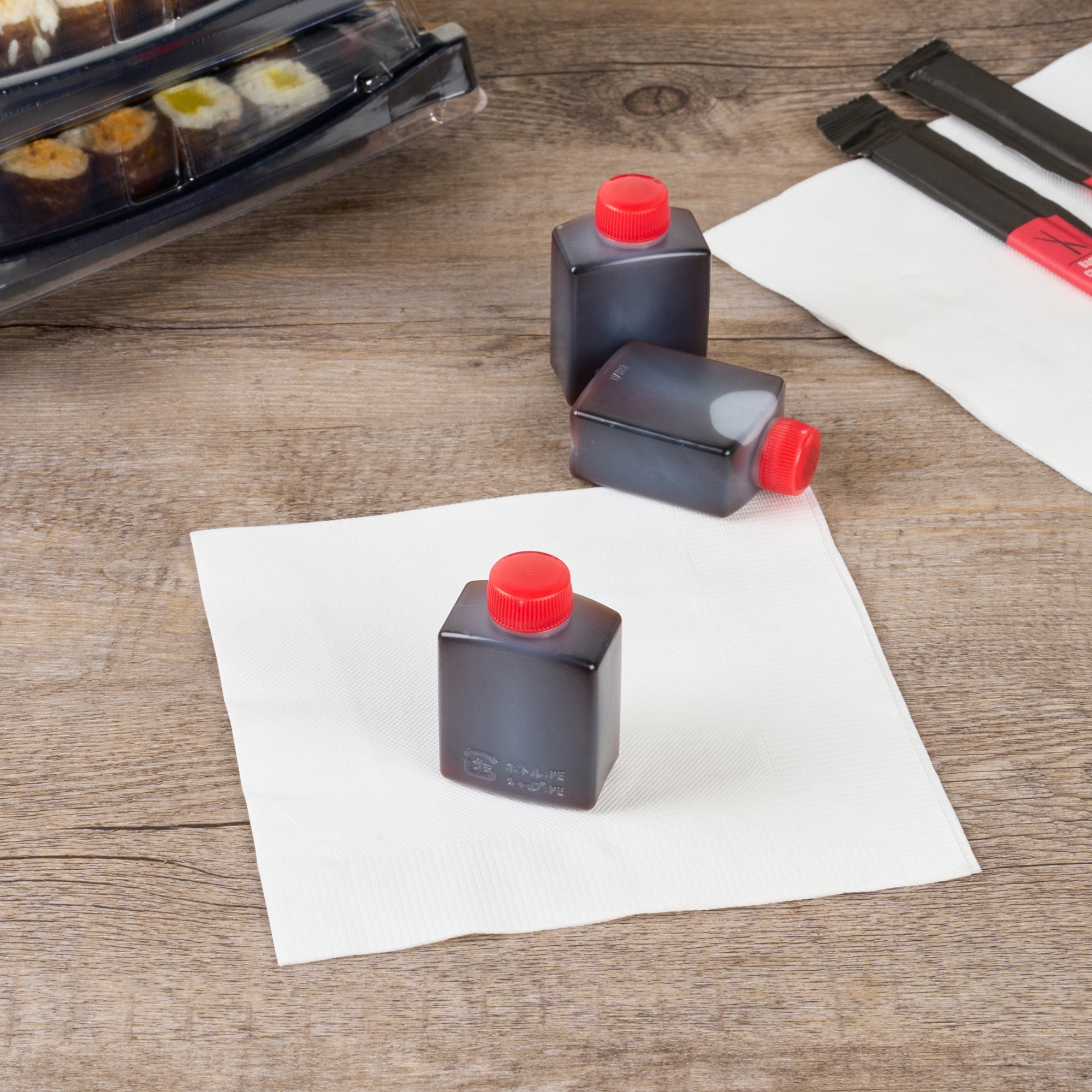Bento Tek 2 oz Translucent Plastic Soy Sauce Bottle - with Red Cap - 1 1/2" x 1" x 2 1/2" - 1000 count box