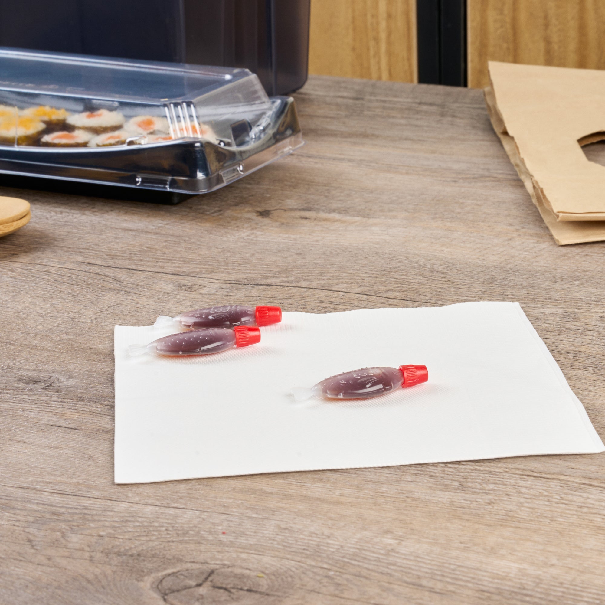 Bento Tek 3 mL Translucent Plastic Fish Soy Sauce Bottle - with Red Cap - 2 1/4" x 1/2" x 1" - 100 count box
