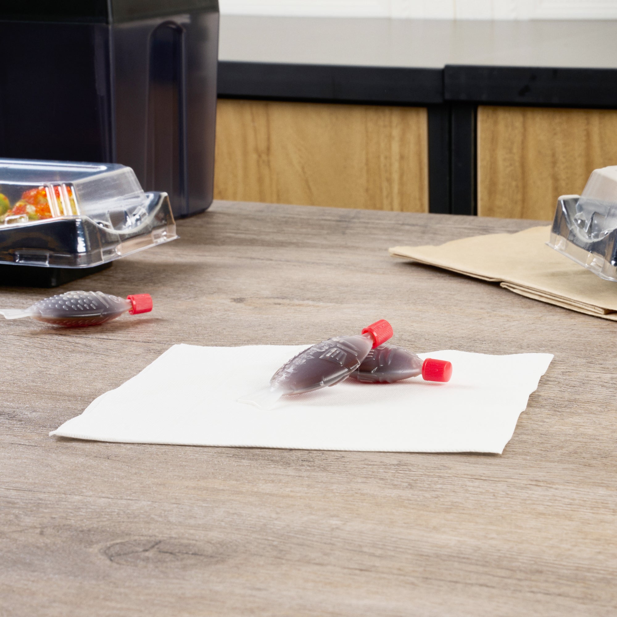 Bento Tek 8 mL Translucent Plastic Fish Soy Sauce Bottle - with Red Cap - 3" x 1/2" x 1 1/4" - 1000 count box