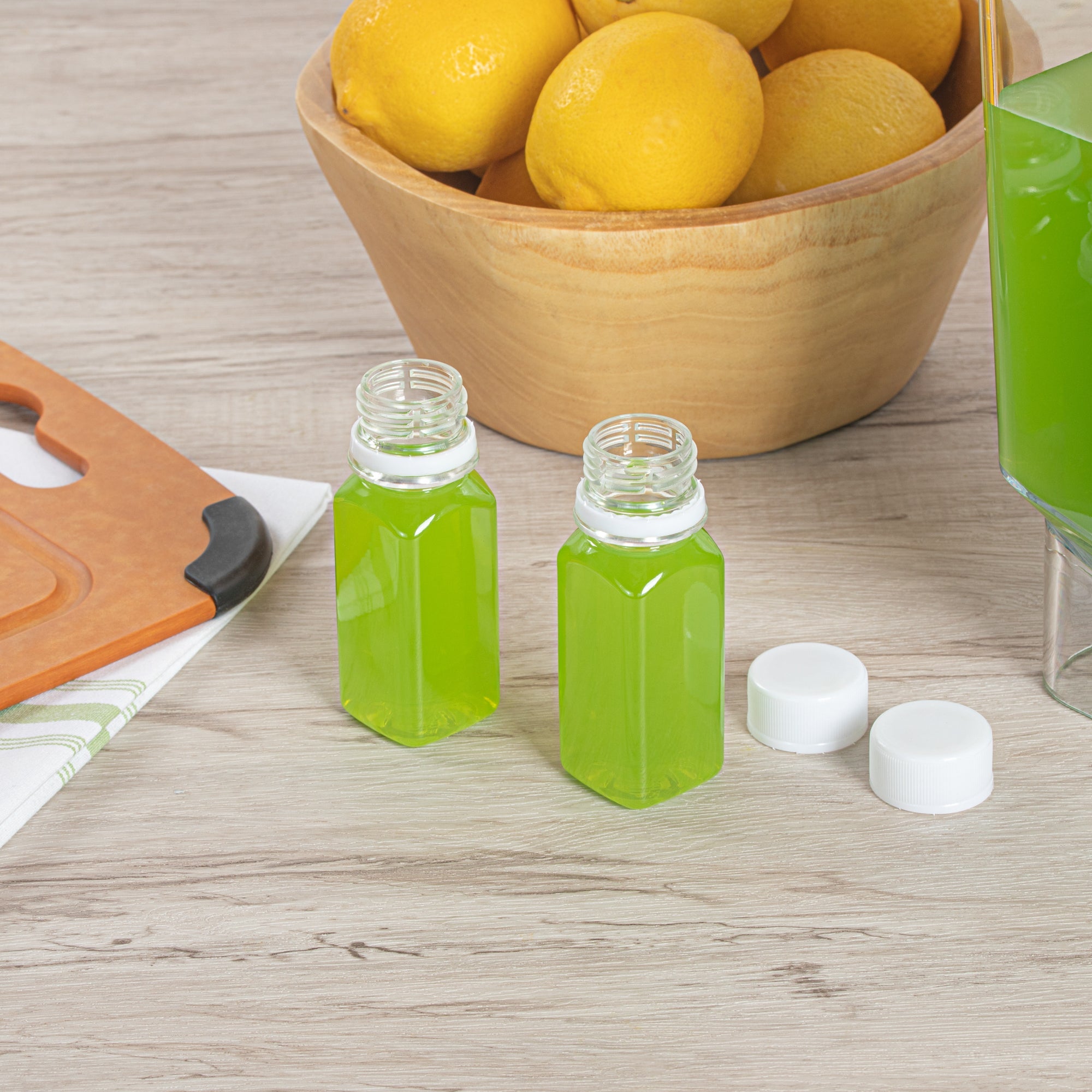 Bottle Tek 2 oz Clear Plastic Energy Shot Bottle - with Safety Cap, Straight Sided - 1 1/4" x 1 1/4" x 3 3/4" - 100 count box