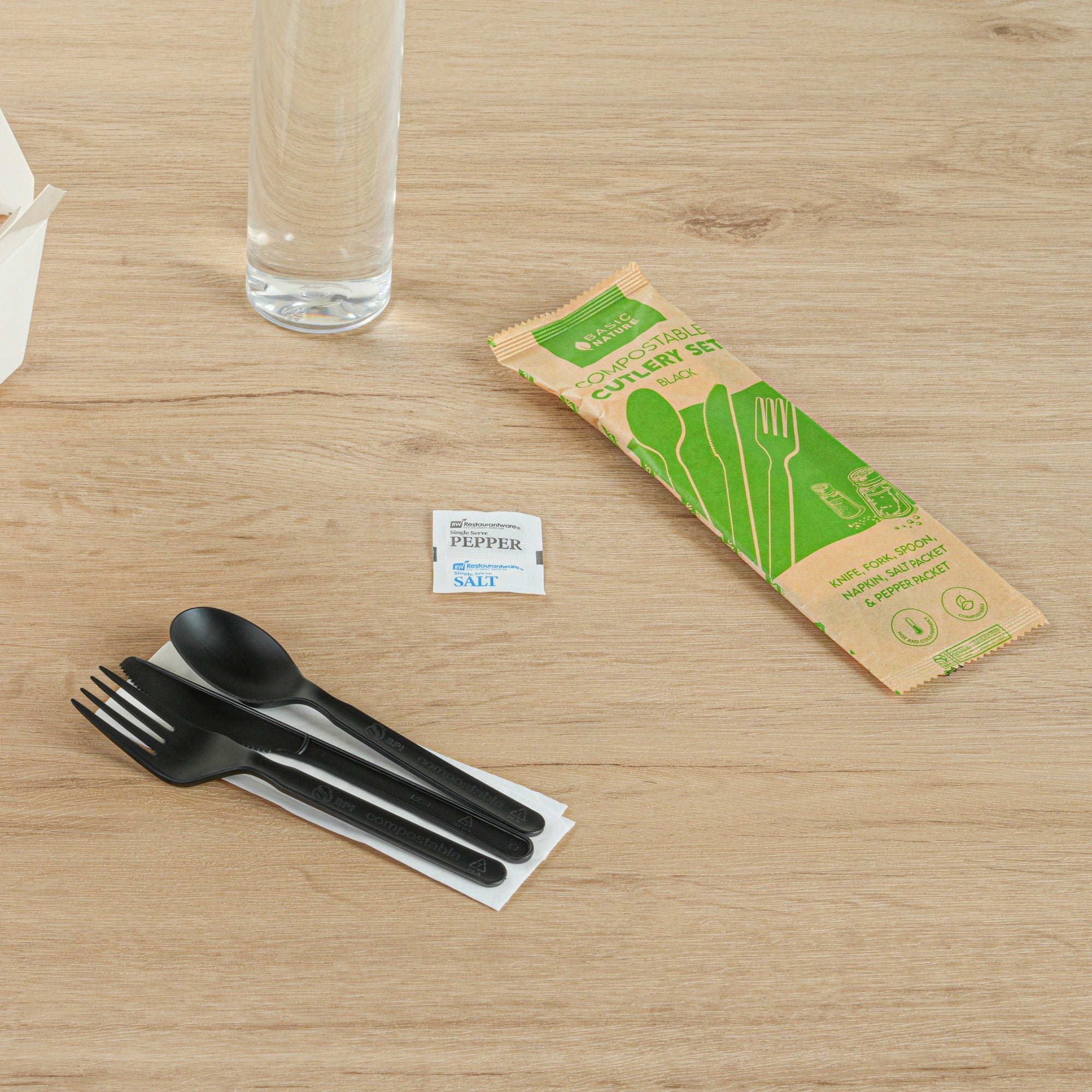 Basic Nature Black PLA Plastic Cutlery Set - with Napkin and Salt / Pepper Packets, Wrapped, Compostable - 6 1/4" - 250 count box