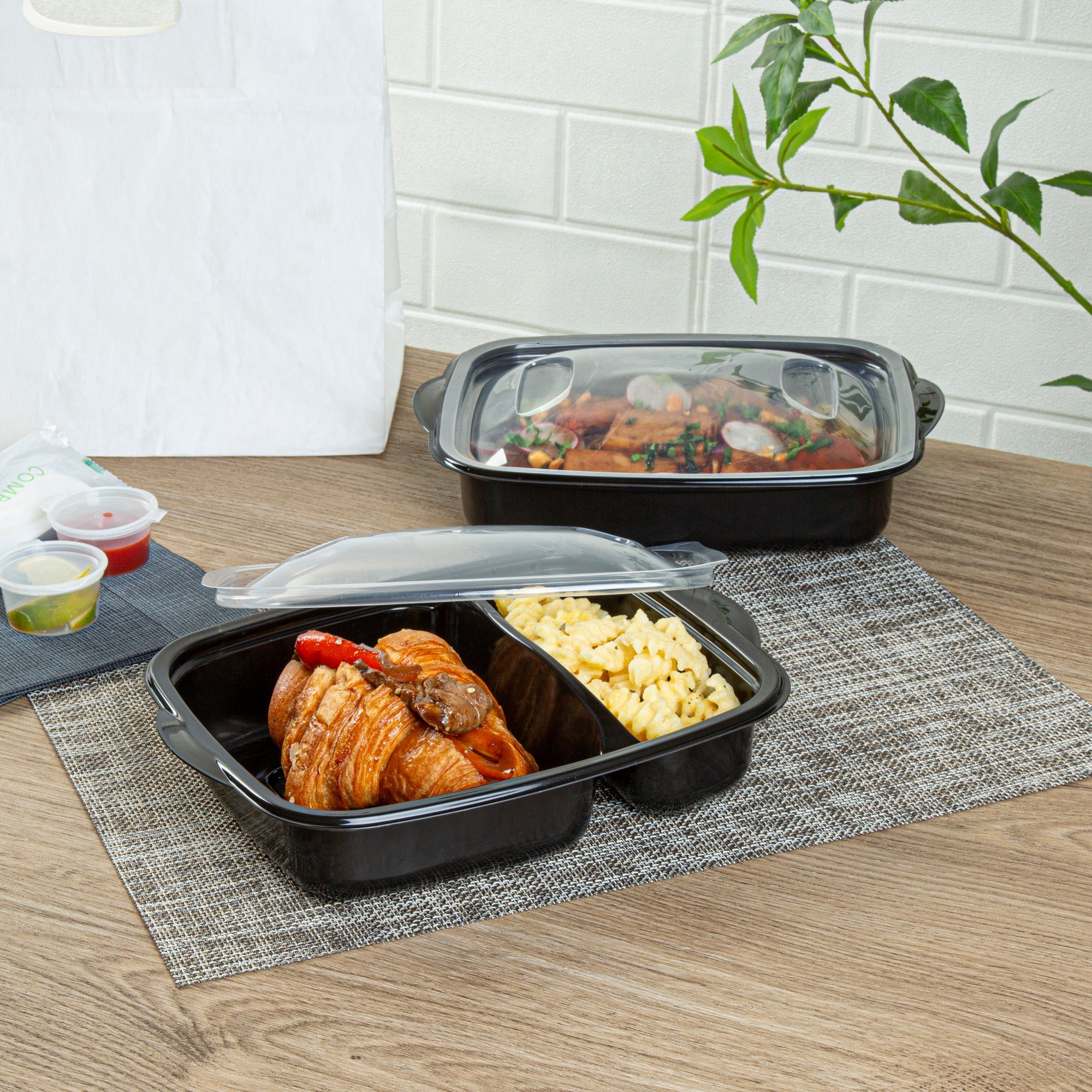 Chef 101 36 oz Rectangle Black Plastic Food Container - with Clear Lid, Microwavable, 2 Compartments - 8 3/4" x 7" x 2 1/4" - 50 count box