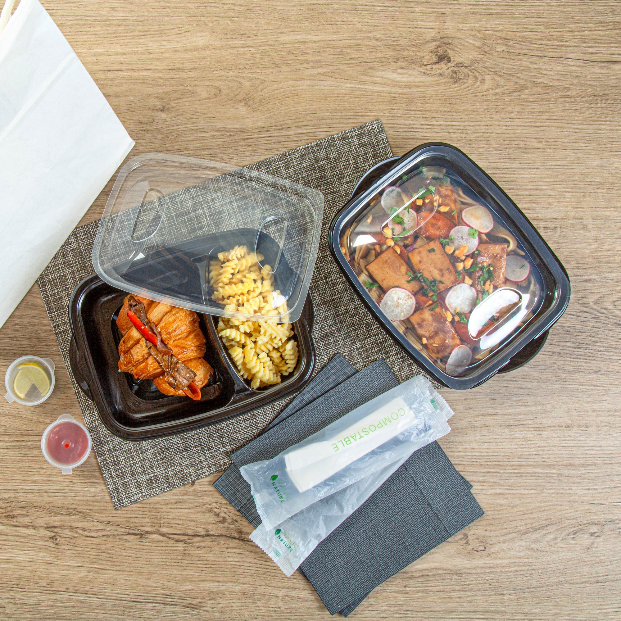 Chef 101 36 oz Rectangle Black Plastic Food Container - with Clear Lid, Microwavable, 2 Compartments - 8 3/4" x 7" x 2 1/4" - 50 count box