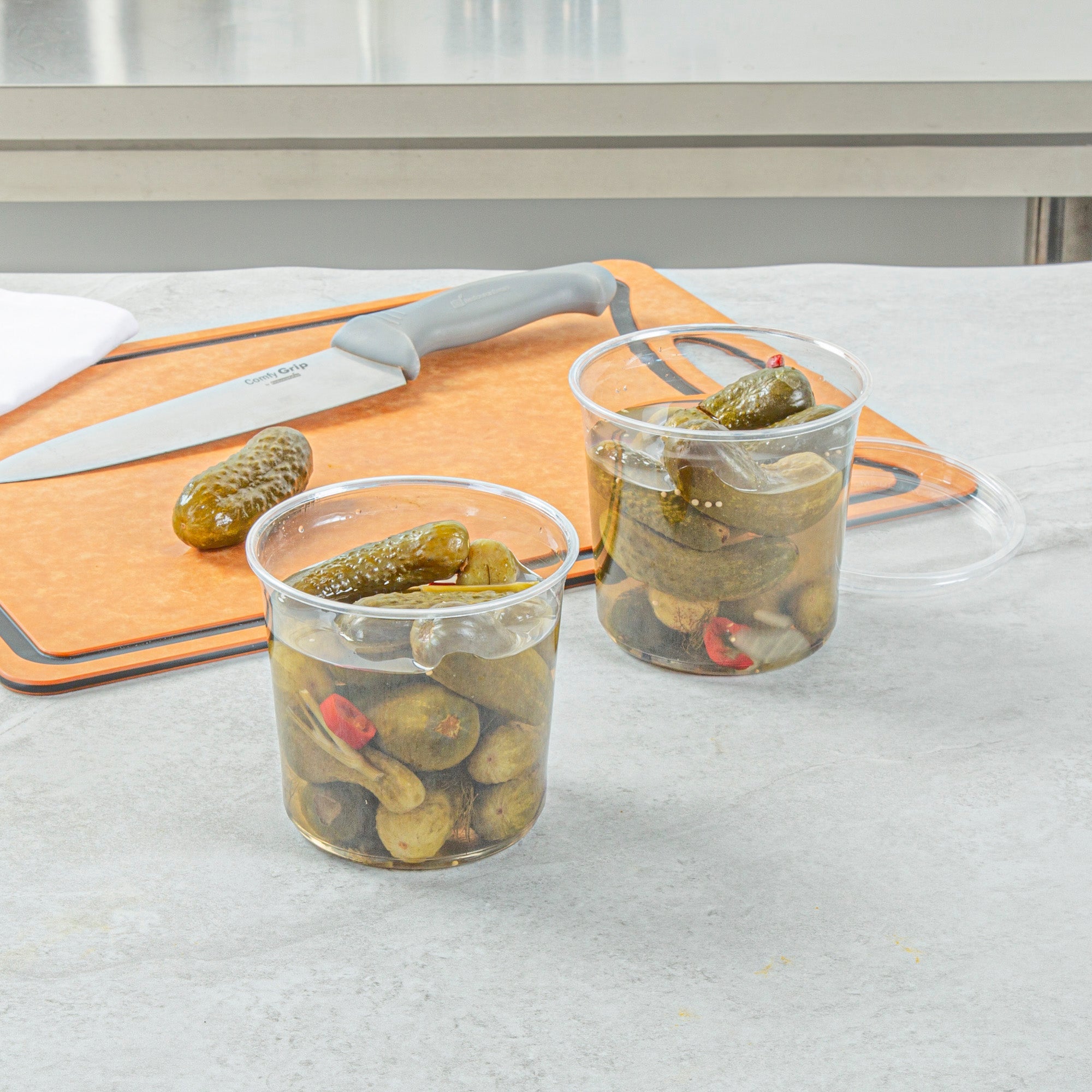 Thermo Tek 24 oz Round Clear Plastic To Go Deli Container - 4 1/2" x 4 1/2" x 4 1/4" - 100 count box