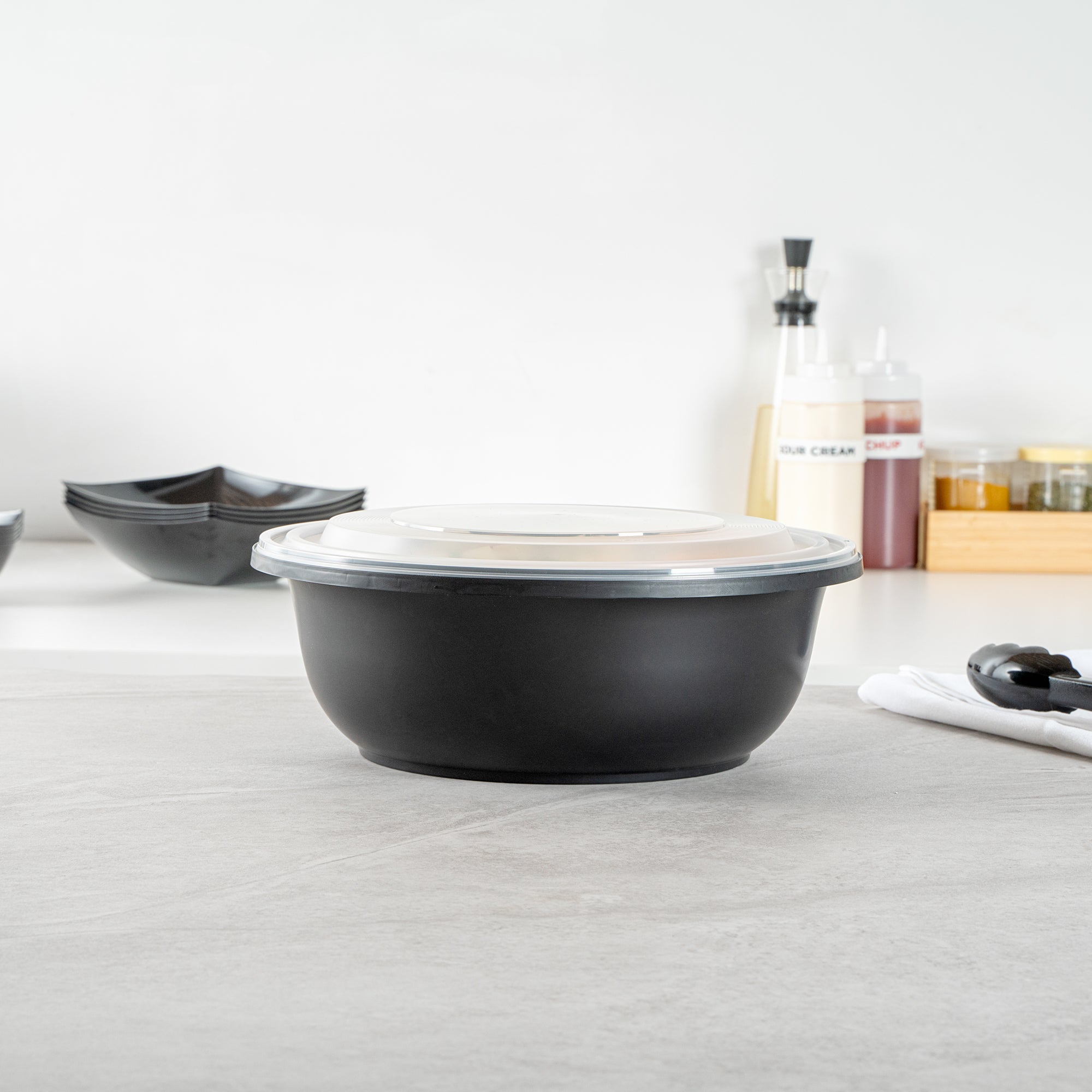 Cater Tek 169 oz Round Black Catering / Serving Bowl - with Clear Lid, Microwavable - 11 3/4" x 11 3/4" x 4 1/2" - 25 count box