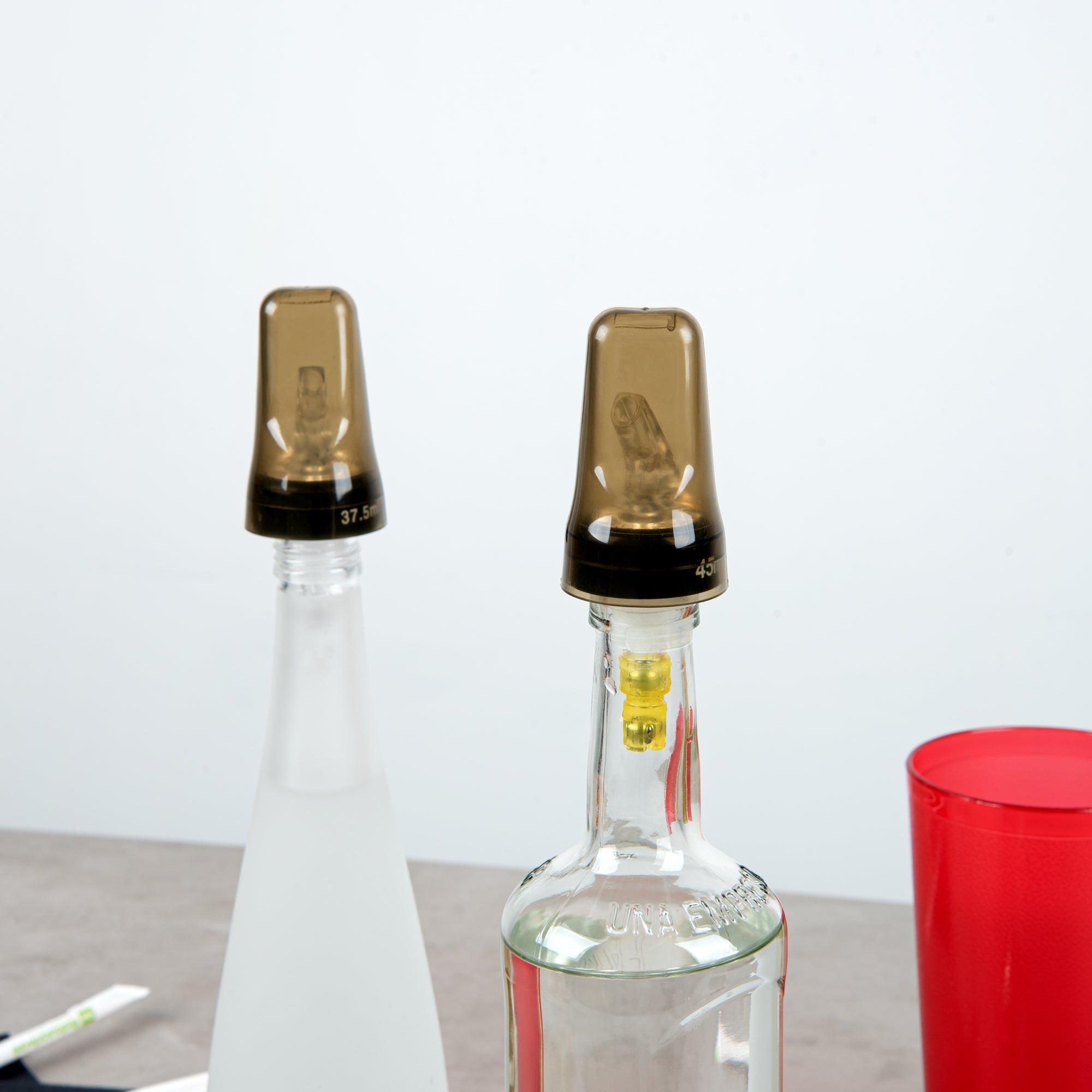 Bar Lux Translucent Plastic Liquor Pourer Cover - Universal - 1 3/4" x 1 3/4" x 3" - 100 count box