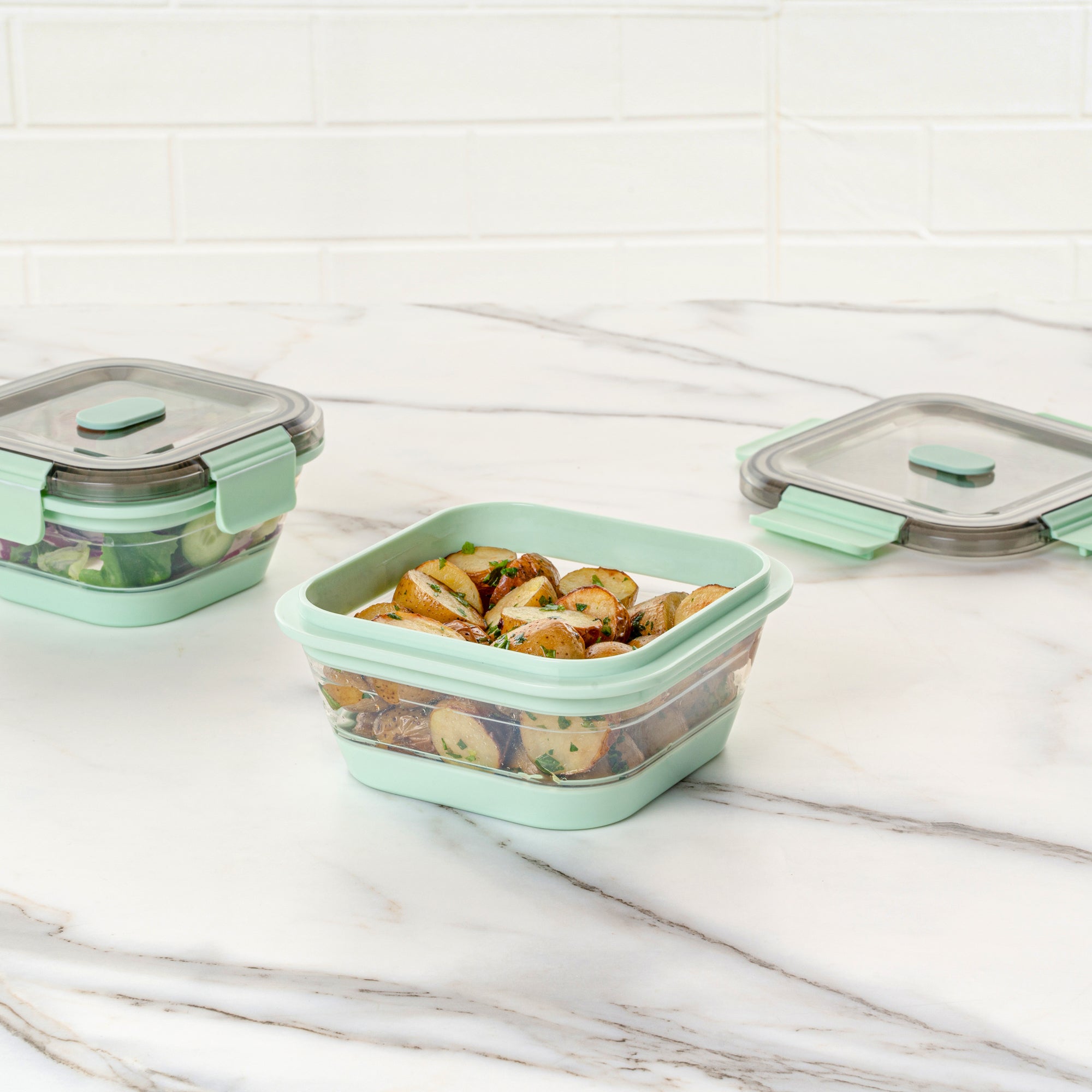 Fresh Hero 24 oz Green Plastic Airtight Food Storage Container - with Vented Lid, Collapsible - 6" x 6" x 2 3/4" - 1 count box