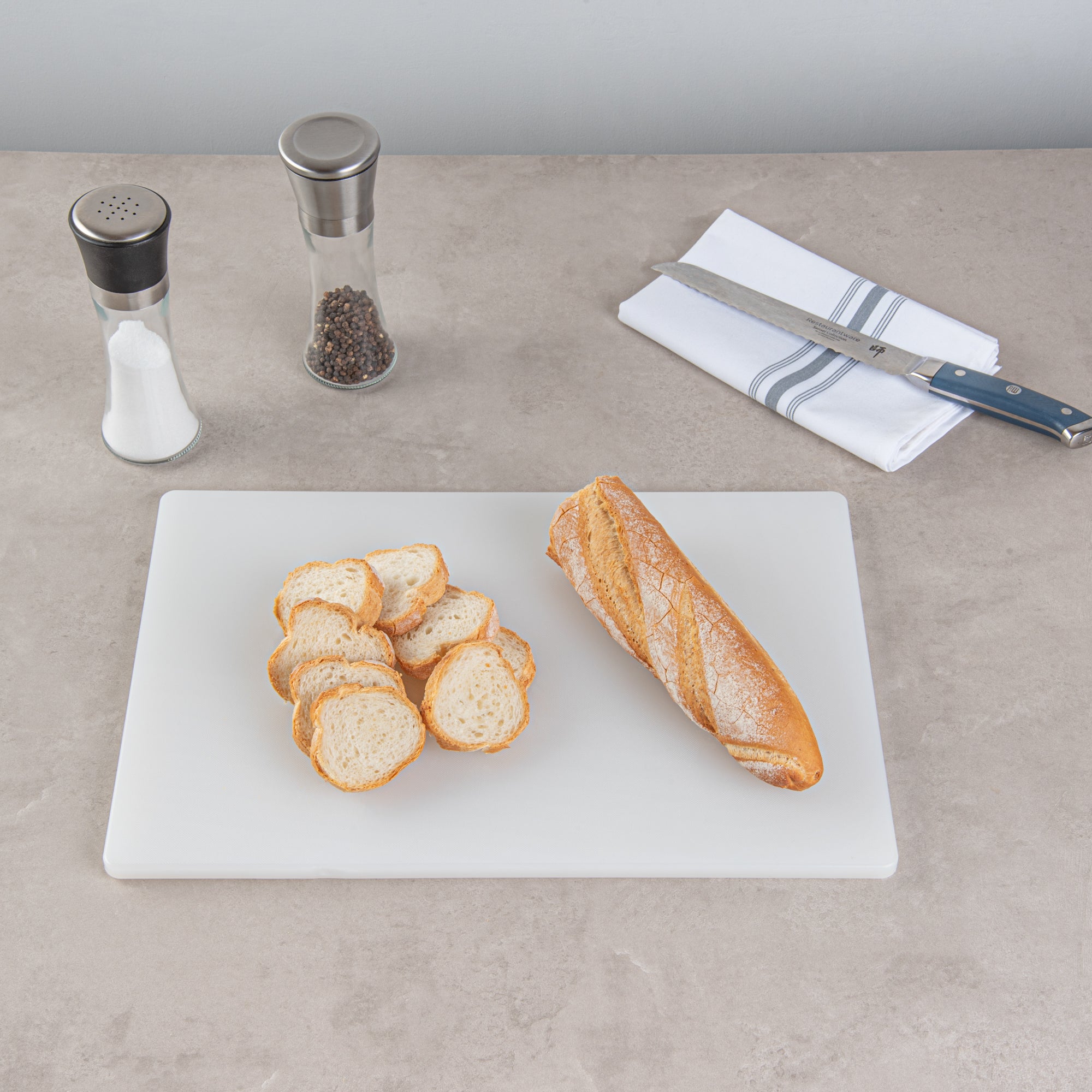Chef 101 White Plastic Cutting Board - 18" x 12" x 1/2" - 10 count box