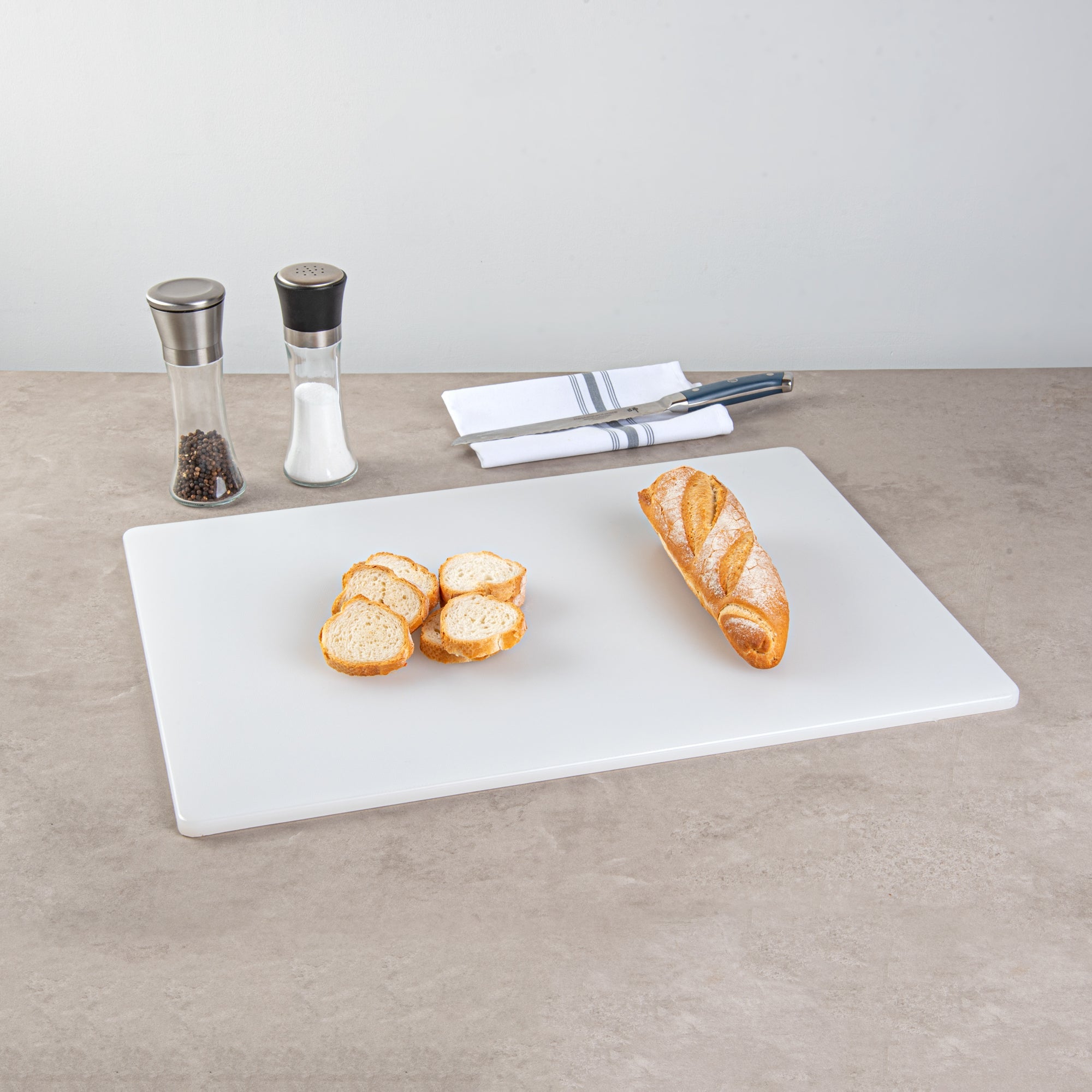 Chef 101 White Plastic Cutting Board - 24" x 18" x 1/2" - 1 count box