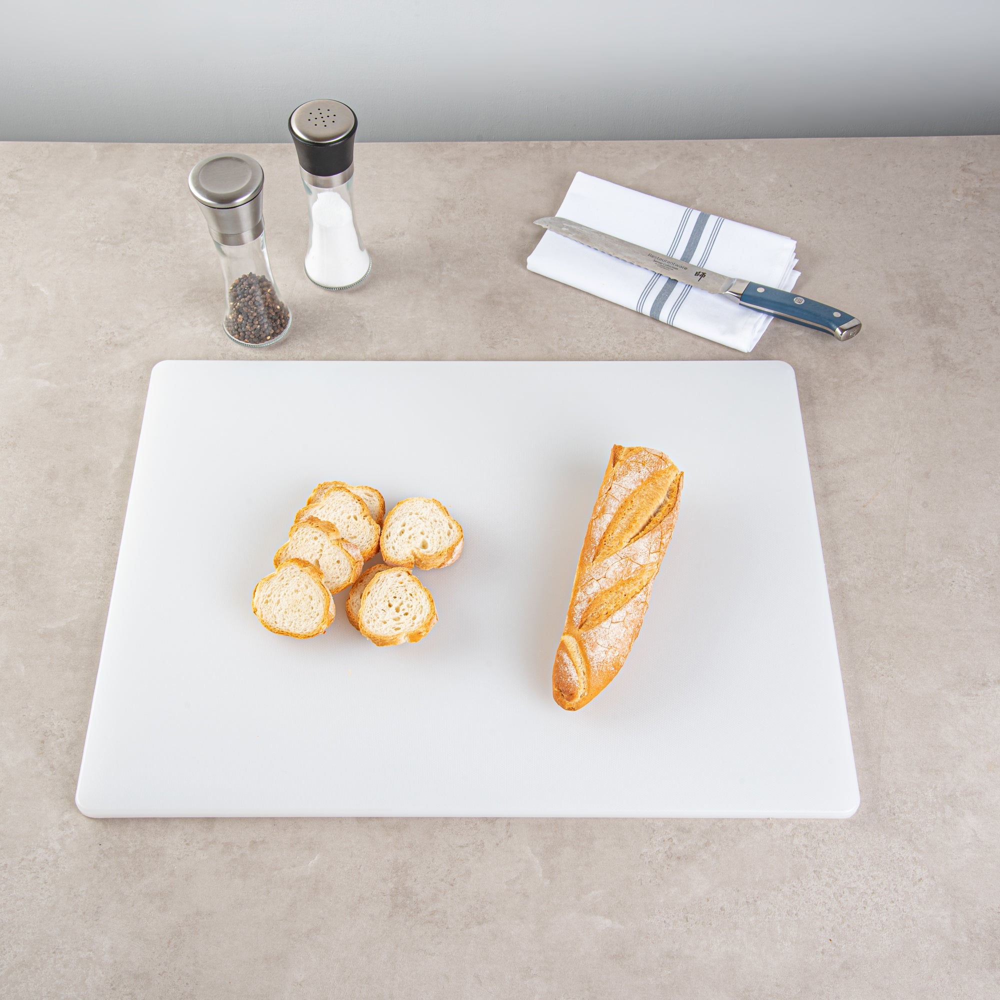 Chef 101 White Plastic Cutting Board - 24" x 18" x 1/2" - 10 count box