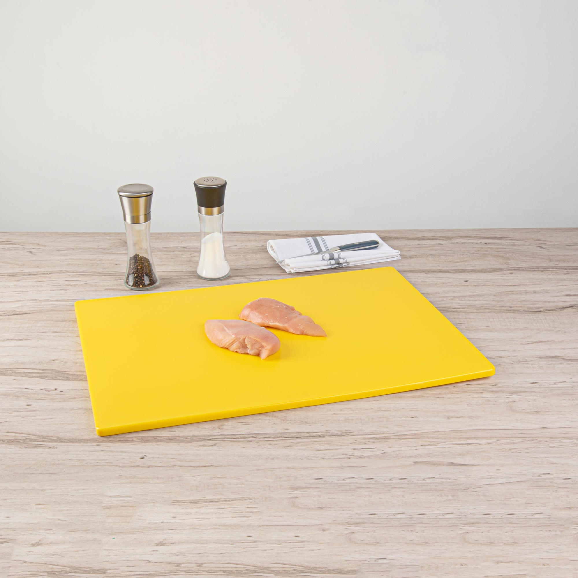 Chef 101 Yellow Plastic Cutting Board - 24" x 18" - 10 count box