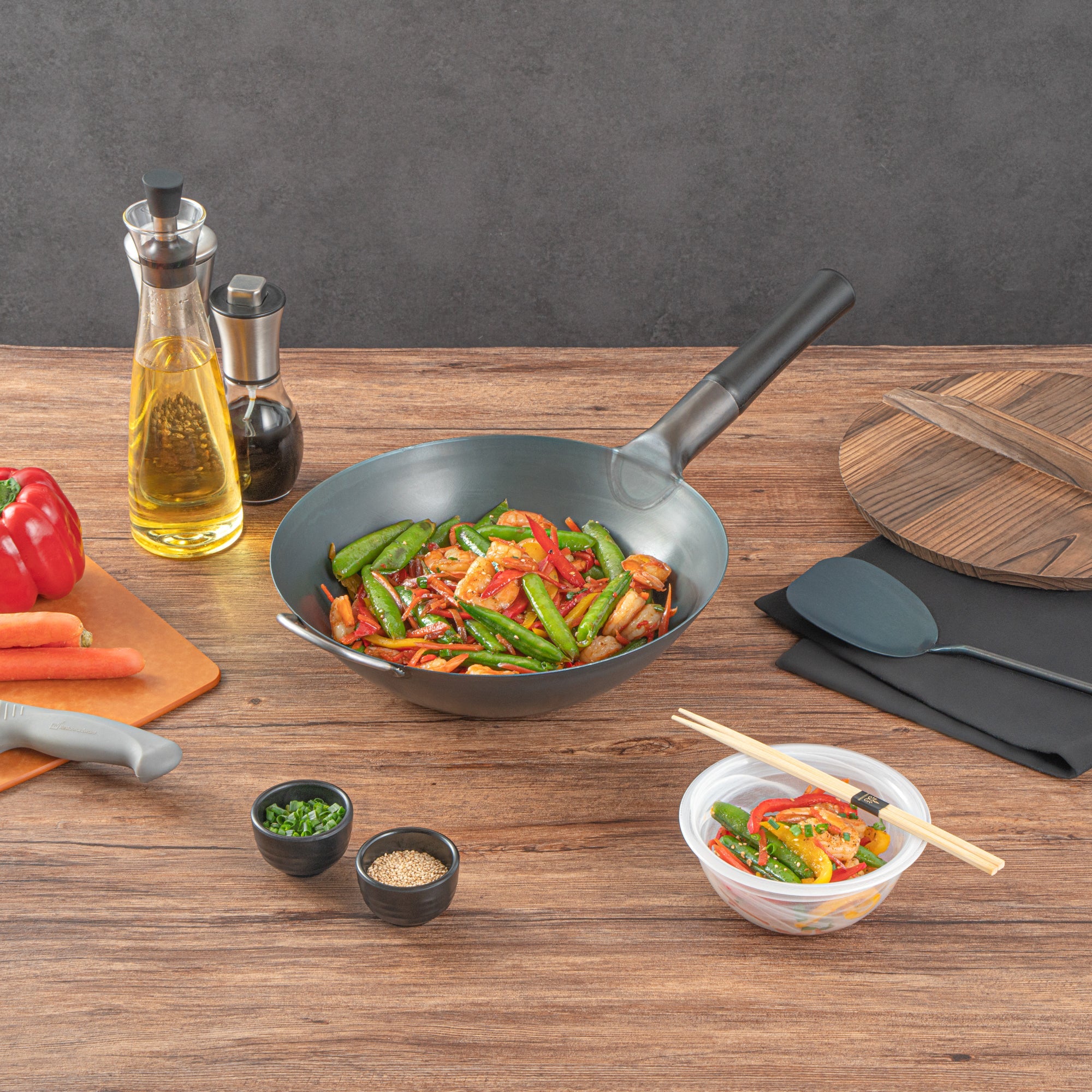 Motomori 12" Black Carbon Steel Flat Bottom Wok / Stir Fry Pan - Pre-seasoned, with Wooden Handle - 1 count box
