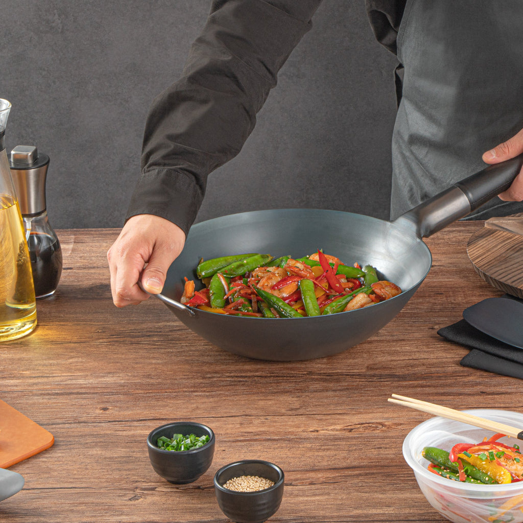 Motomori 12" Black Carbon Steel Flat Bottom Wok / Stir Fry Pan - Pre-seasoned, with Wooden Handle - 1 count box