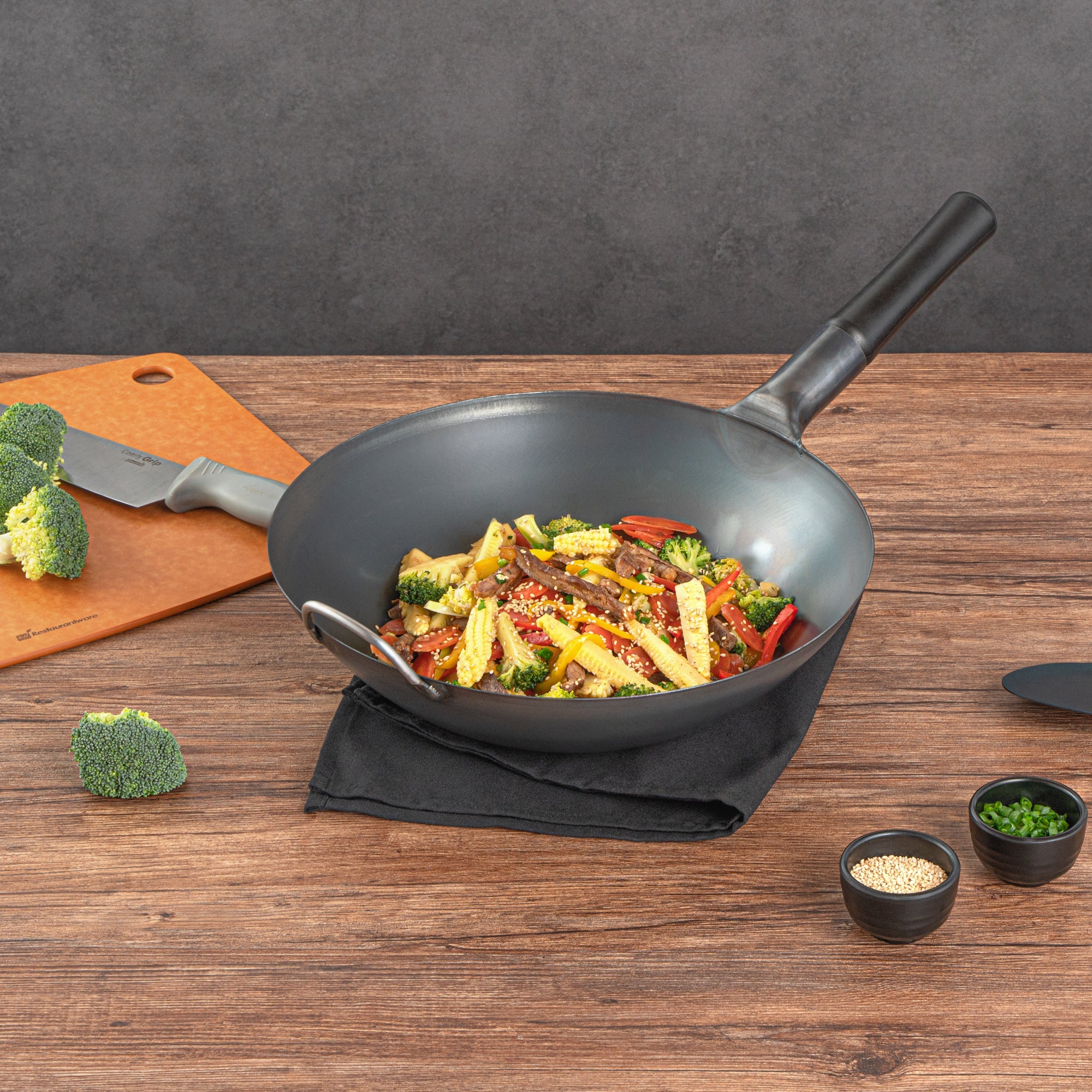 Motomori 14" Black Carbon Steel Flat Bottom Wok / Stir Fry Pan - Pre-seasoned, with Wooden Handle - 1 count box
