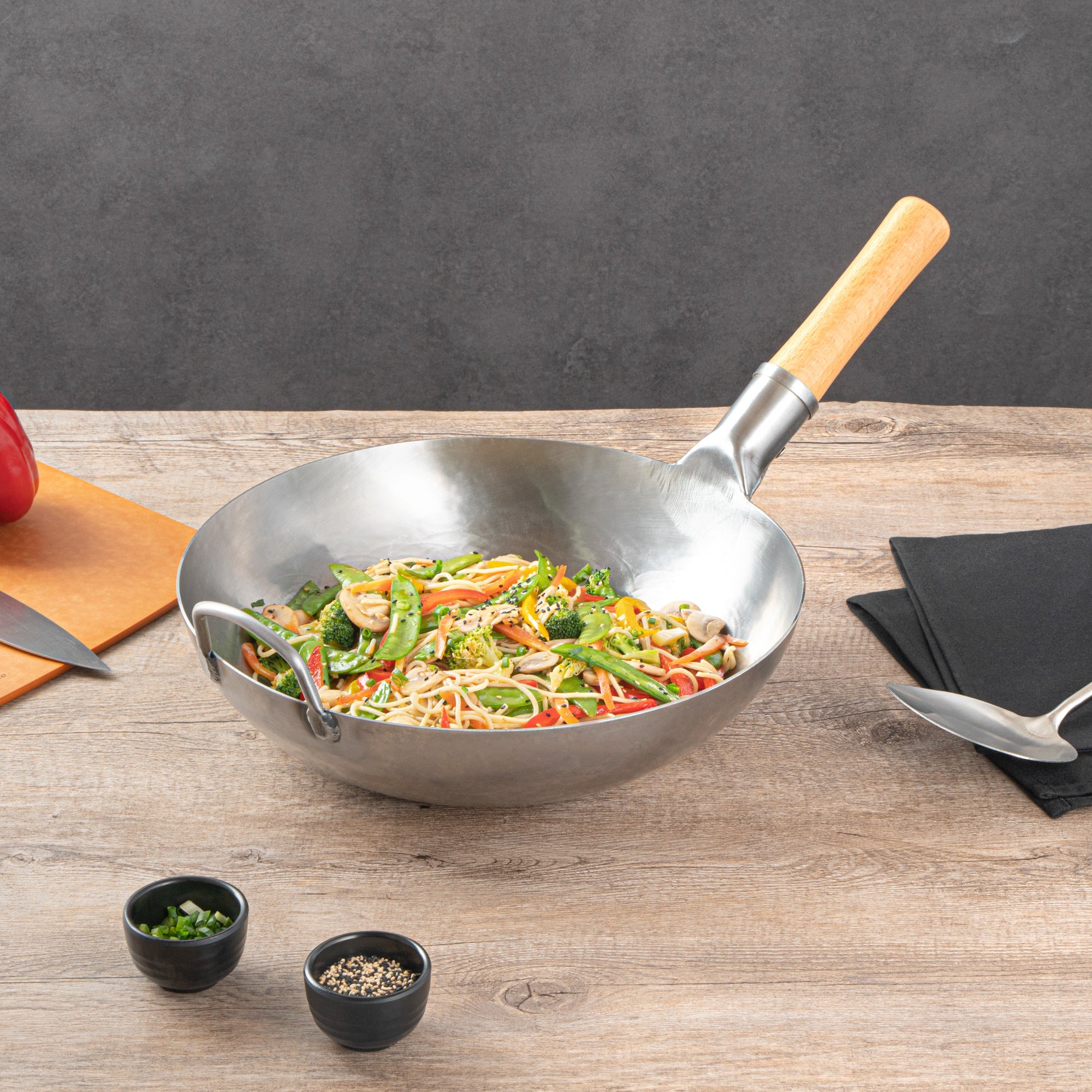 Motomori 13 1/2" Carbon Steel Flat Bottom Wok / Stir Fry Pan - Hand Hammered, with Wooden Handle - 1 count box