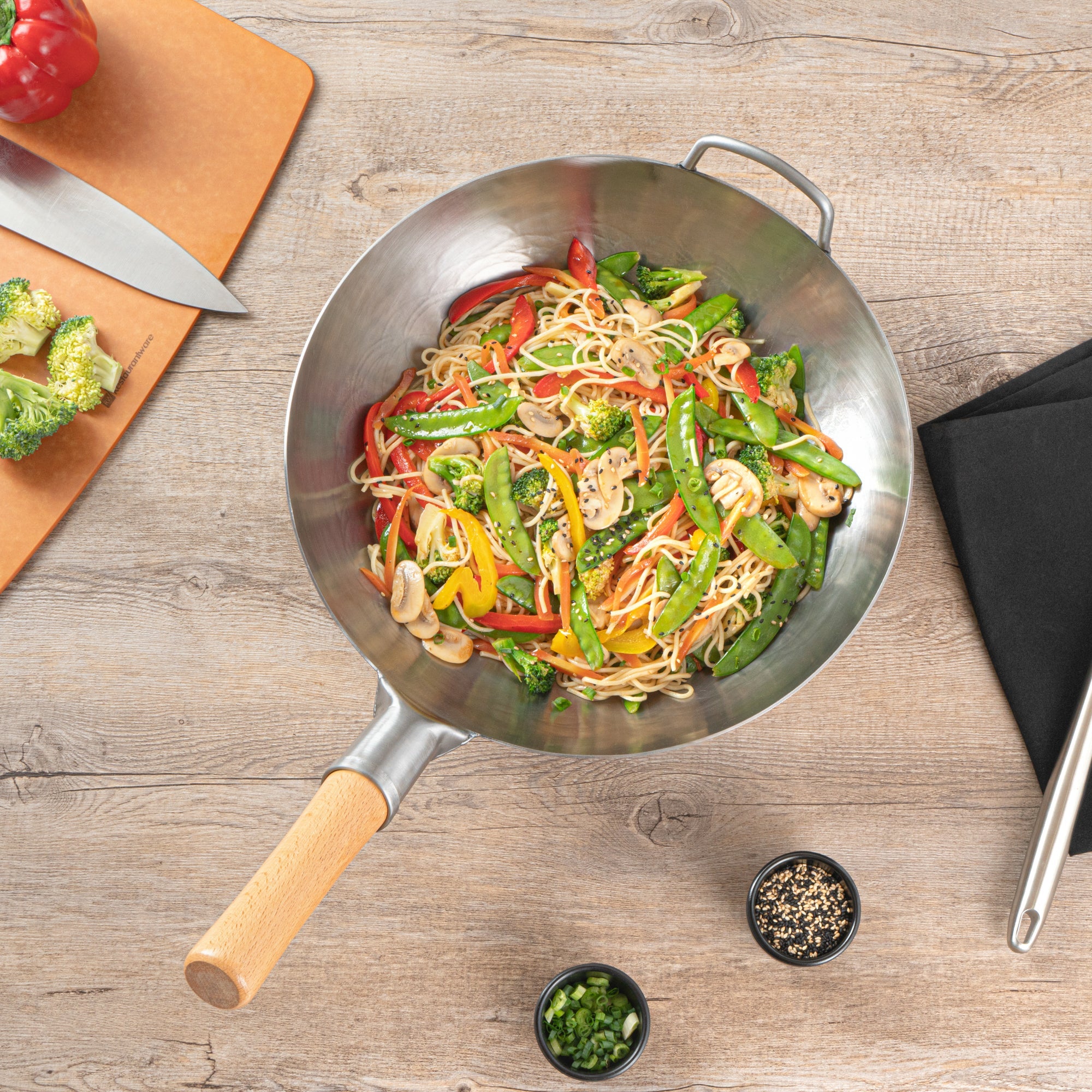 Motomori 13 1/2" Carbon Steel Flat Bottom Wok / Stir Fry Pan - Hand Hammered, with Wooden Handle - 1 count box