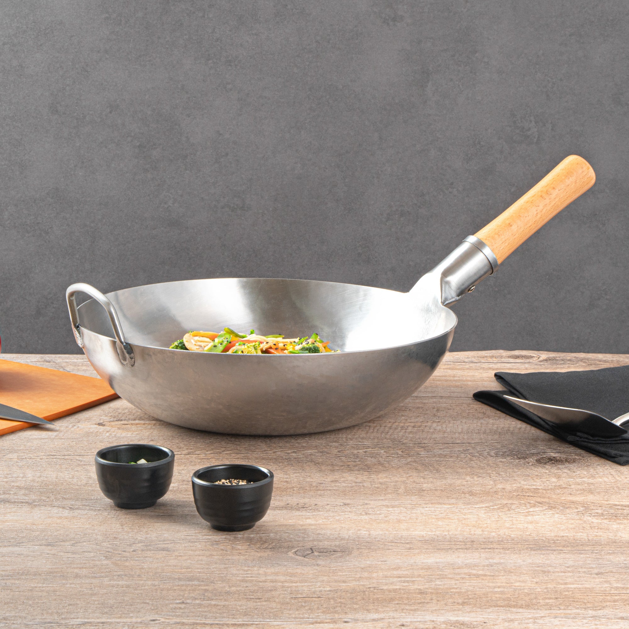 Motomori 13 1/2" Carbon Steel Flat Bottom Wok / Stir Fry Pan - Hand Hammered, with Wooden Handle - 1 count box