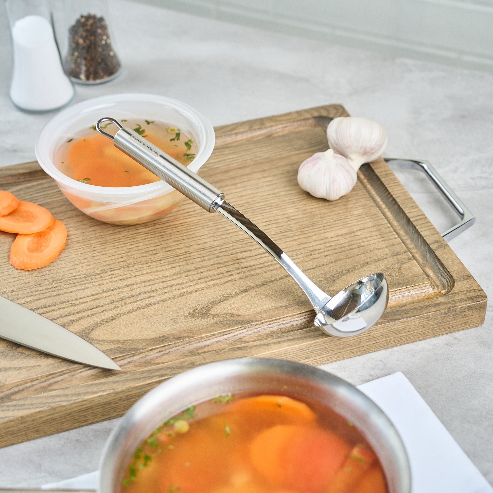 German Standard Stainless Steel Sauce Ladle - One-Piece - 10 3/4'' - 1 count box