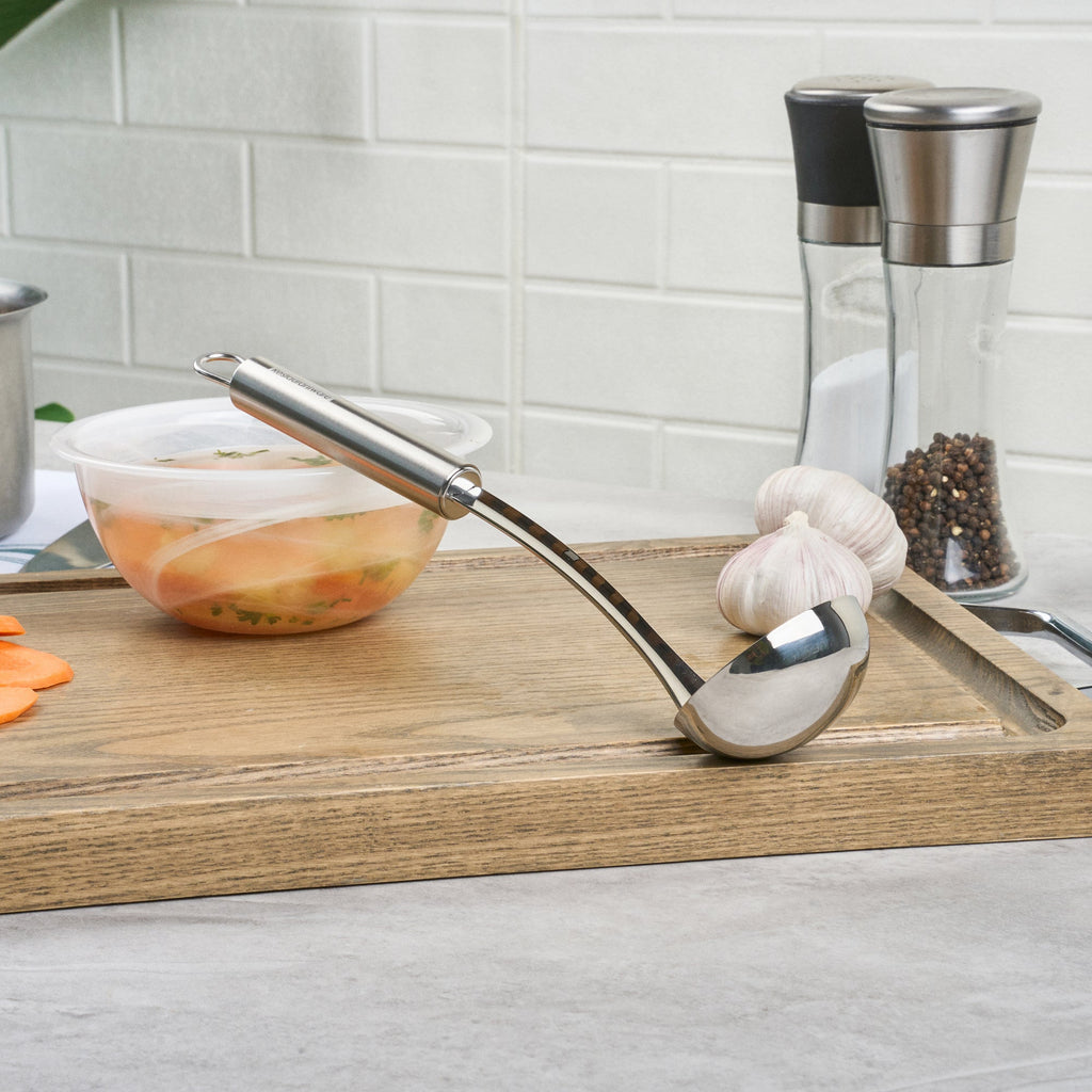 German Standard Stainless Steel Sauce Ladle - One-Piece - 10 3/4'' - 1 count box