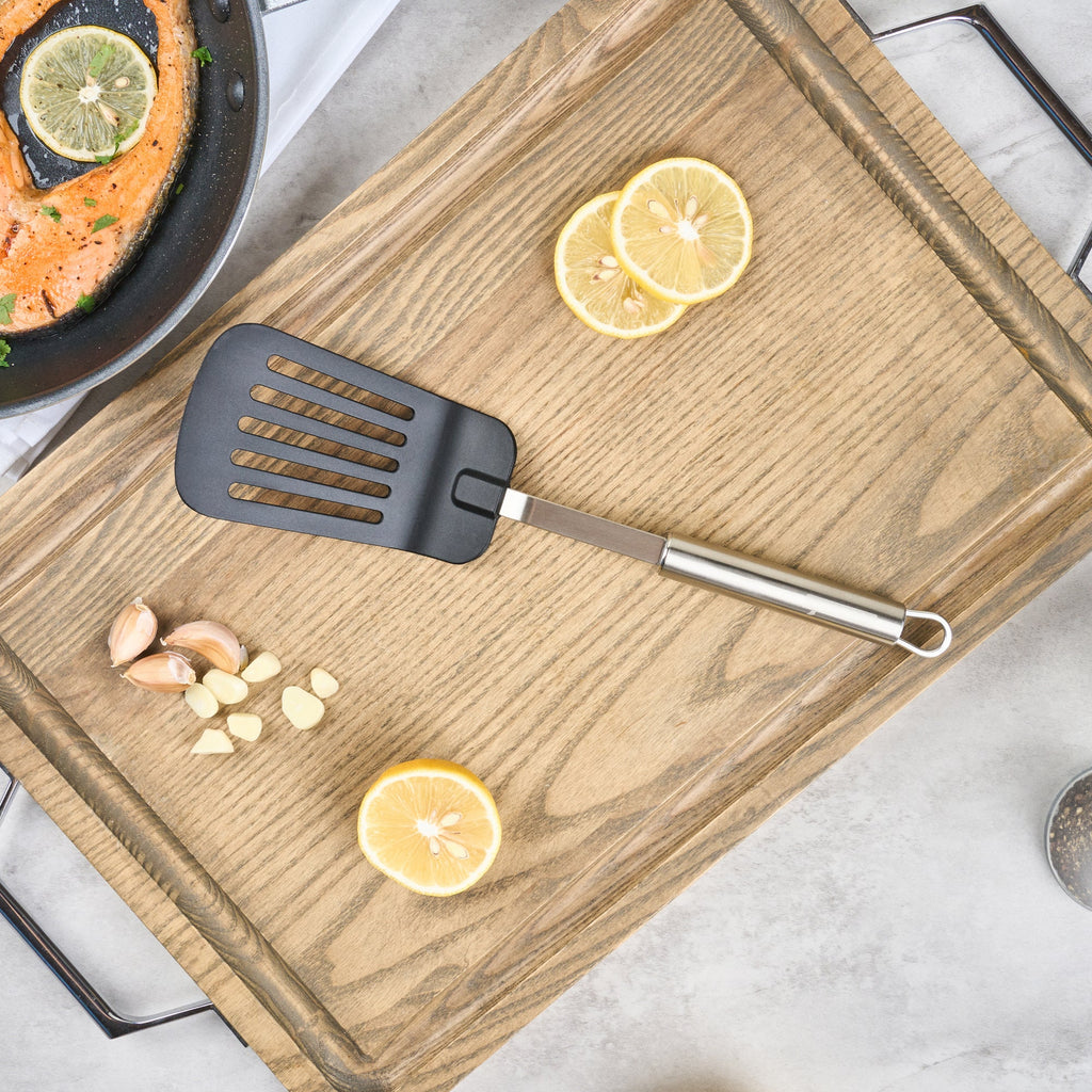 German Standard Black Nylon High Heat Slotted Turner / Spatula - with Stainless Steel Handle - 12 1/2'' - 36 count box