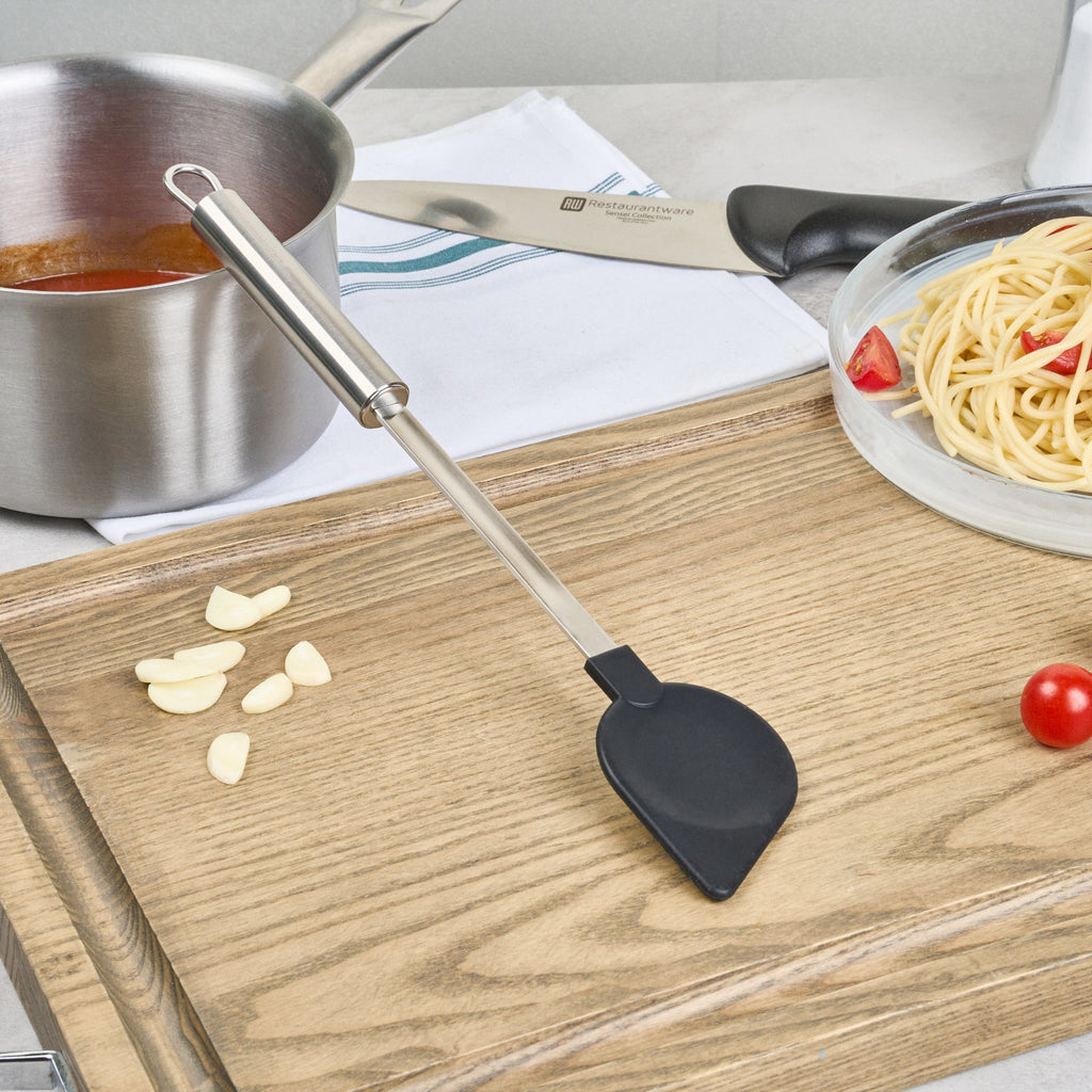 German Standard Black Nylon High Heat Cooking Spoon - Pointed Tip, with Stainless Steel Handle - 12 3/4'' x 2 1/4'' - 1 count box