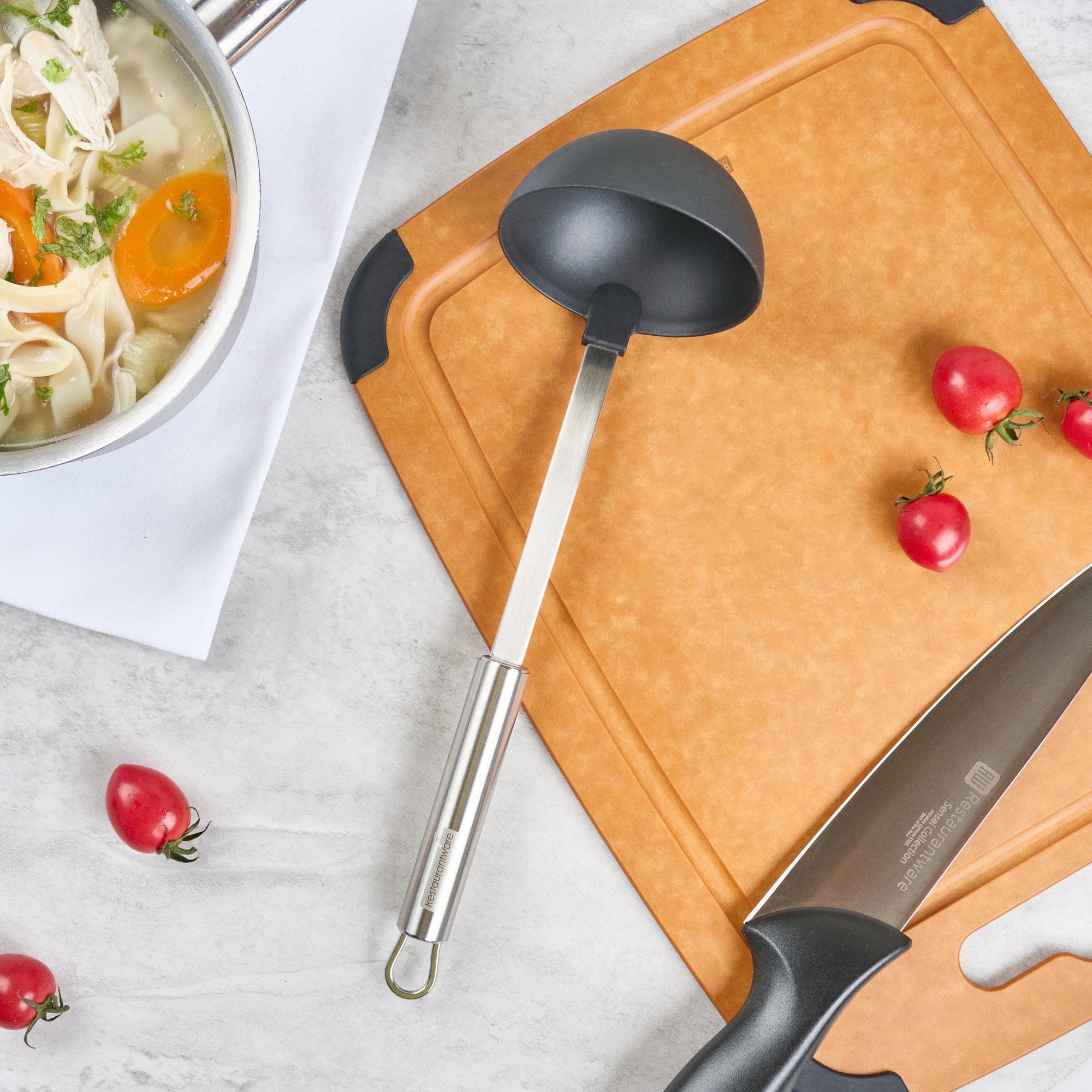 German Standard Black Nylon High Heat Serving Ladle - One-Piece, with Stainless Steel Handle - 12 1/4'' x 3 1/2'' x 3 1/4'' - 1 count box
