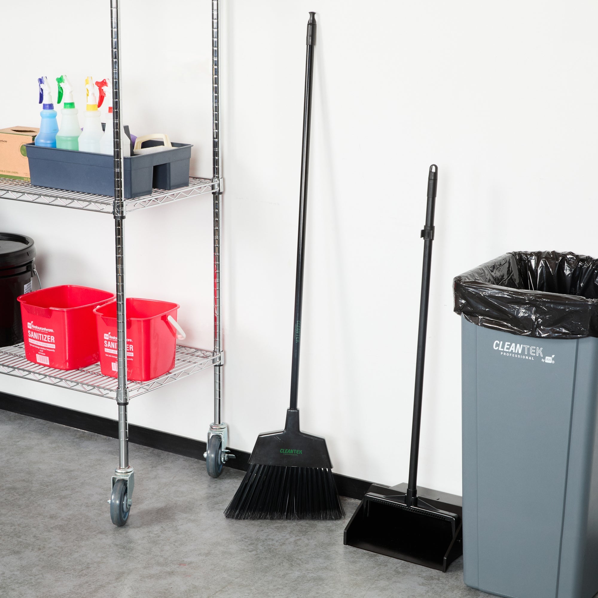 Clean Tek Professional 11 3/4" Black Plastic Angled Broom - with Flagged Bristles, 48" Steel Handle - 1 count box