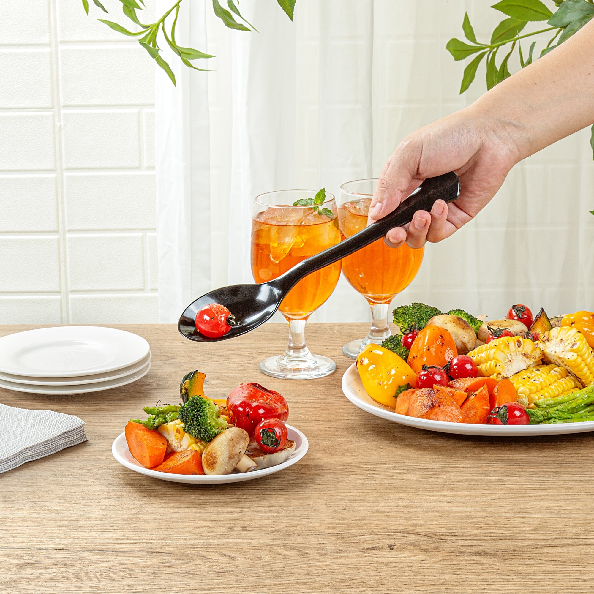 Cater Tek Black Plastic Serving Spoon - 9 3/4" - 100 count box